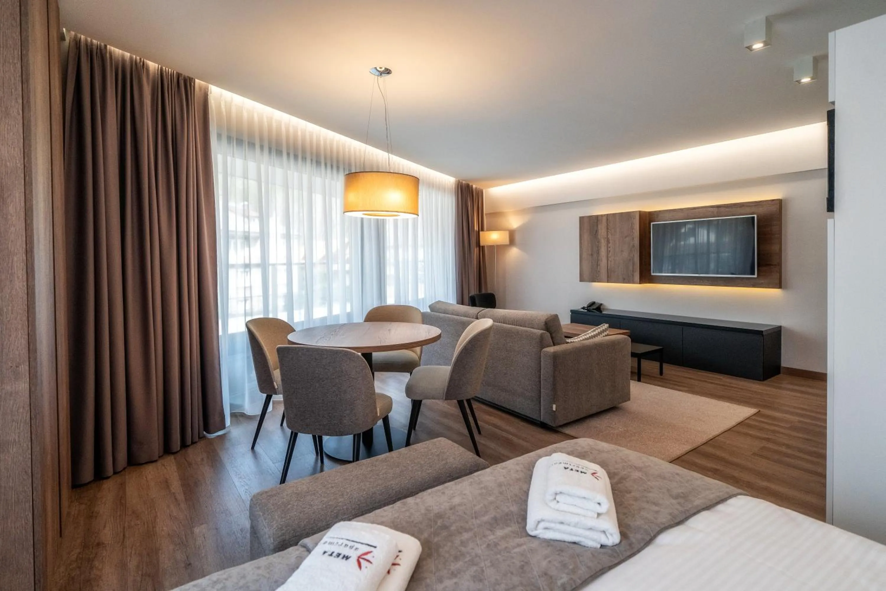 Living room, Bed in Meta Apartments