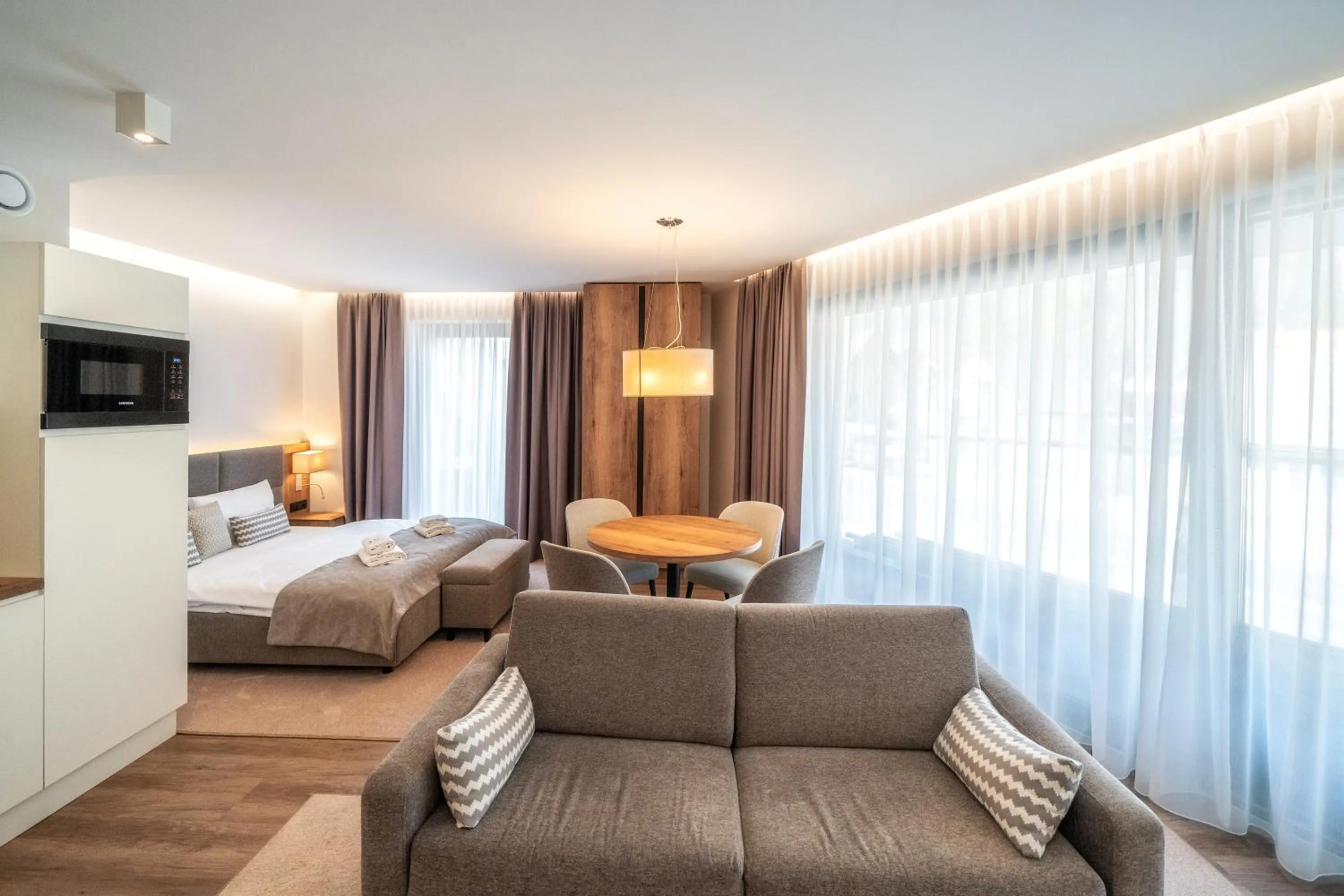 Living room, Bed in Meta Apartments