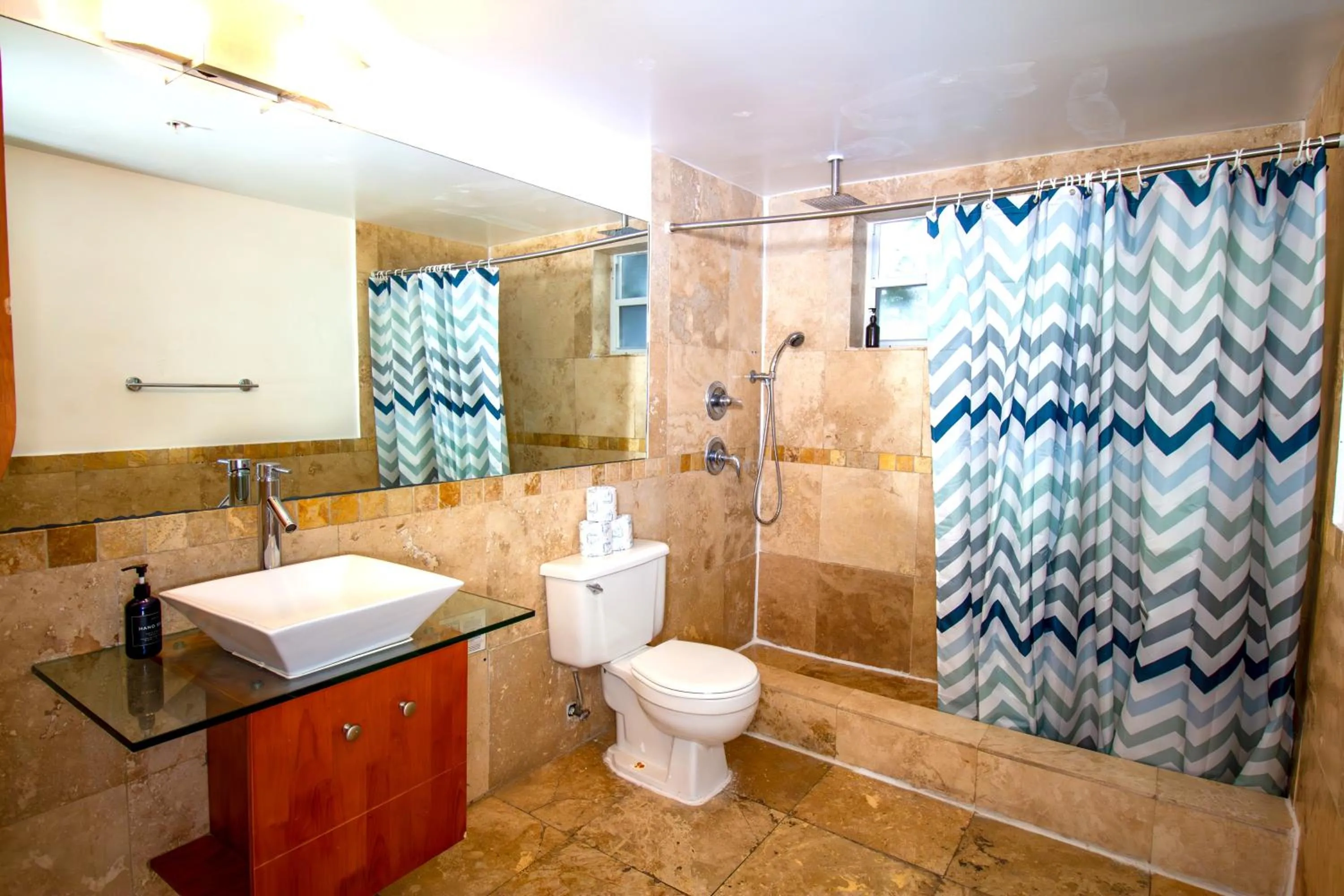 Shower in Hispaniola Apartments Part of the Oasis Casita Collection