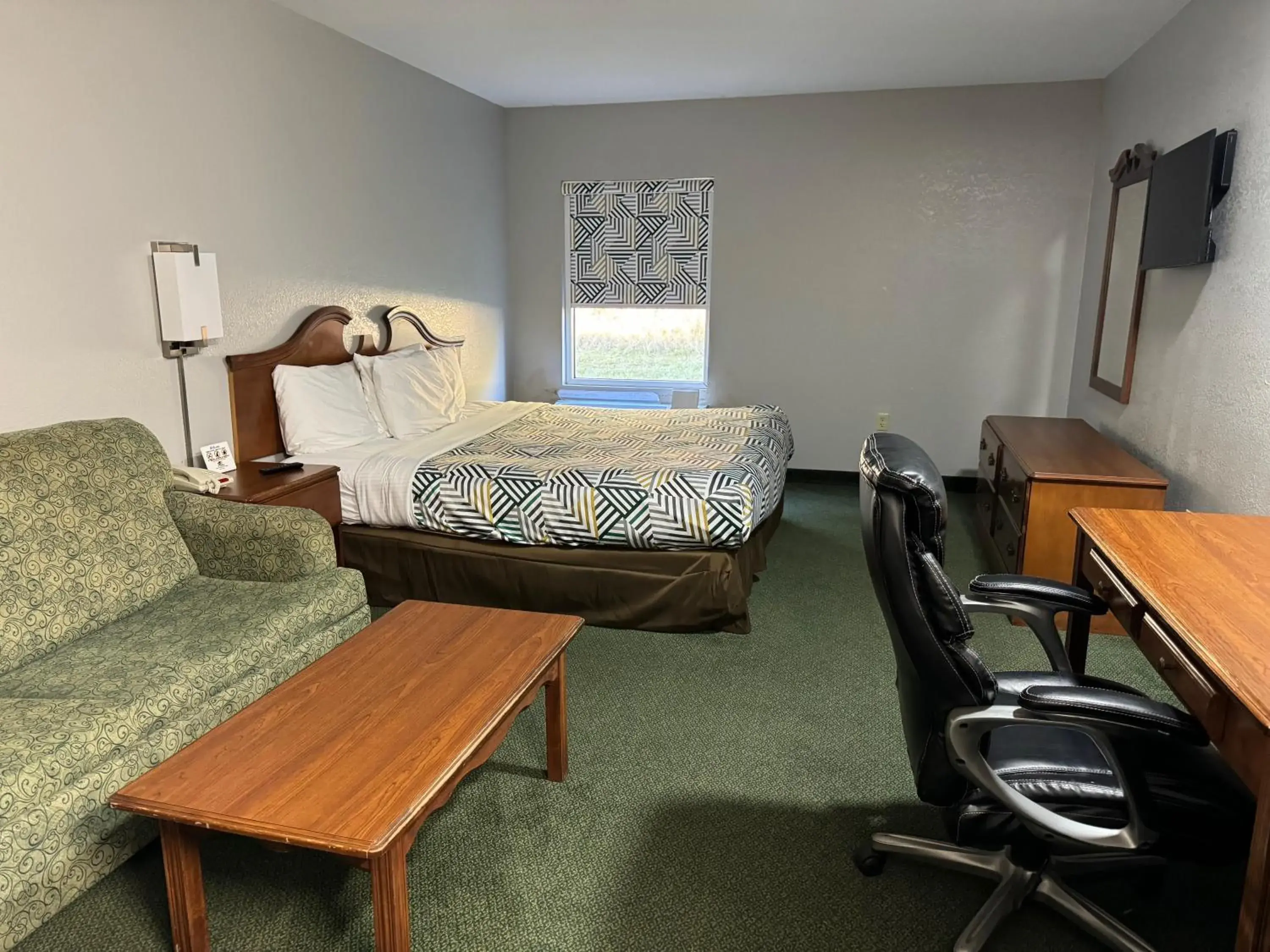 Living room in Star City Inn & Suites Living room in Star City Inn & Suites