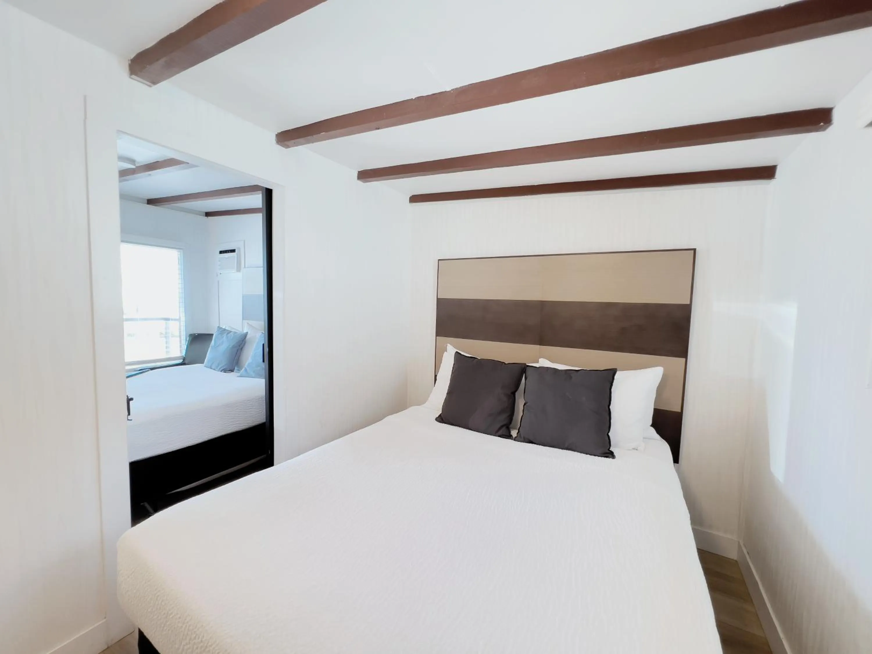 Bed in Oceanside Villas