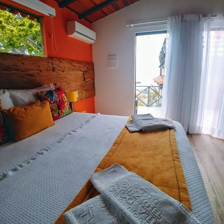 Bed in Pousada Vila do Sol