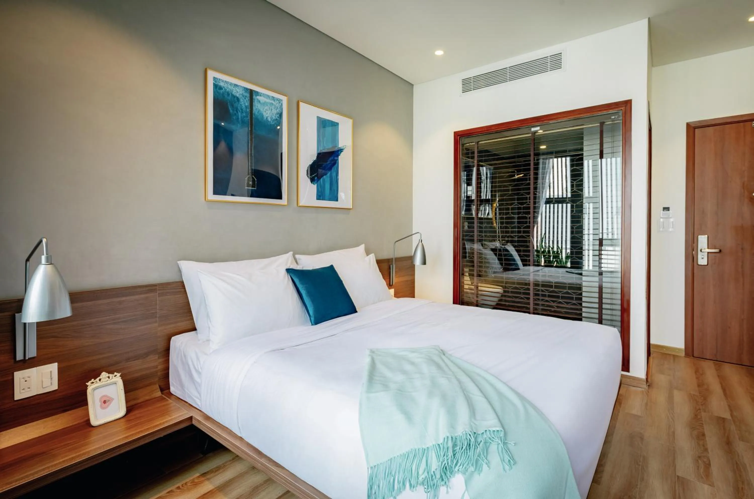 Living room, Bed in The Glomad Boutique Danang