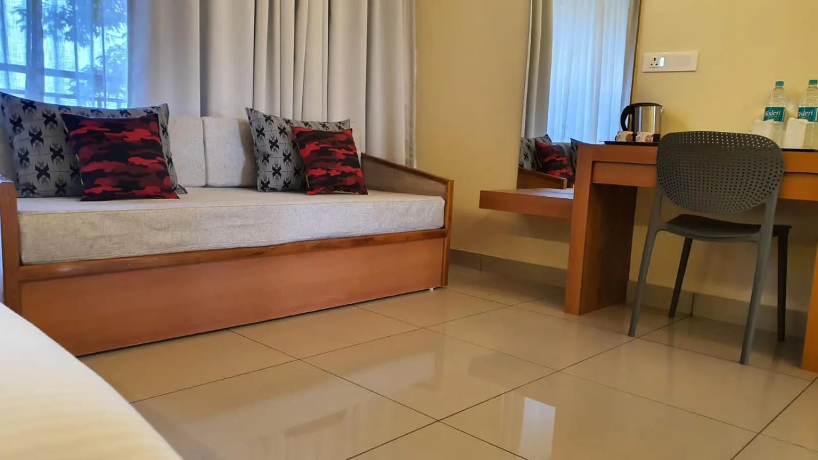 Seating area, Bed in Upavan Resort