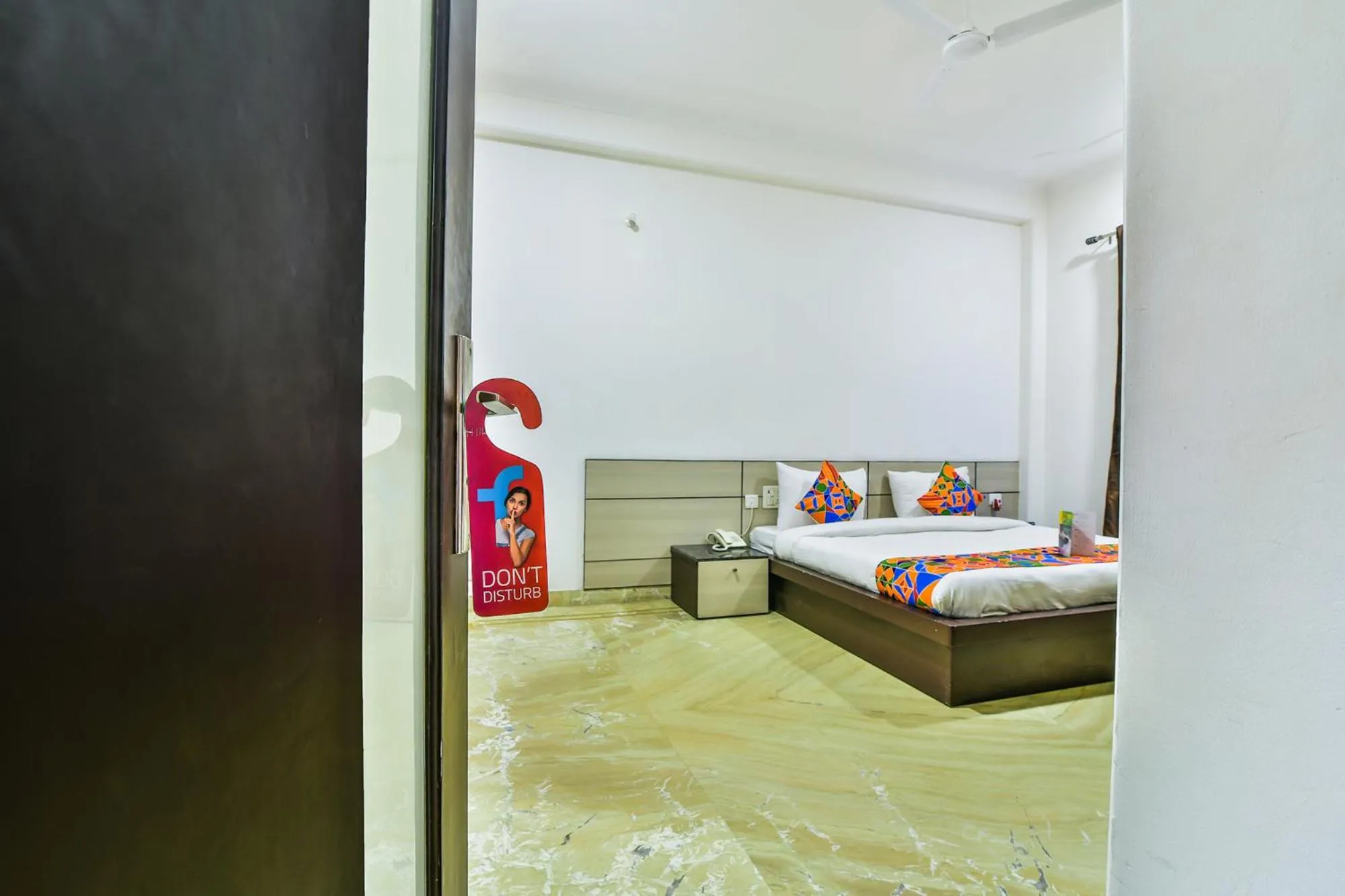 Seating area, Bed in FabHotel Rallkmas Cyber City