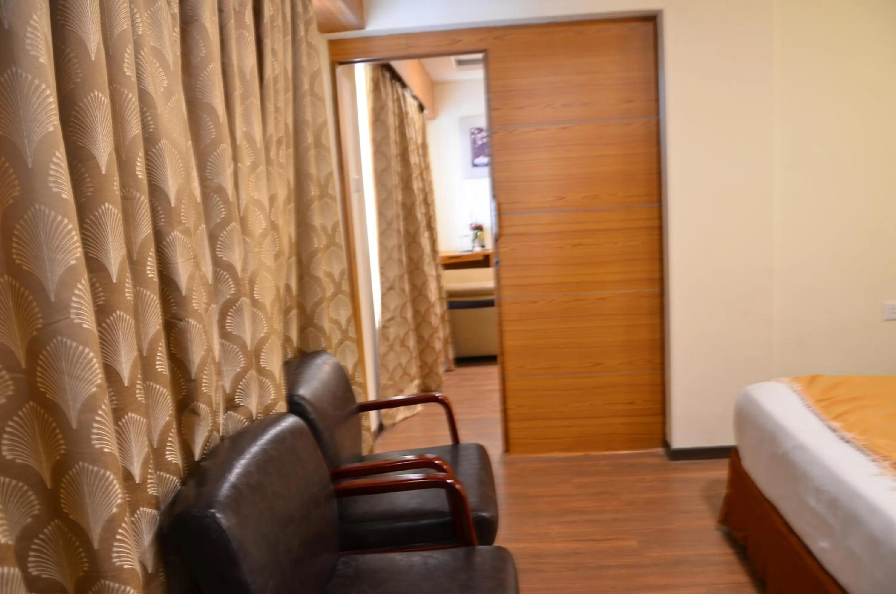 Living room, Bed in Benzz Park Family Resort Kodaikanal