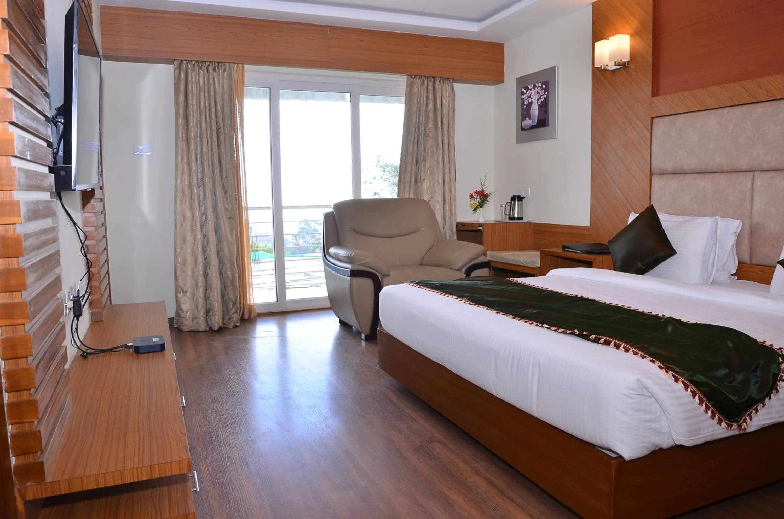 Bed in Benzz Park Family Resort Kodaikanal