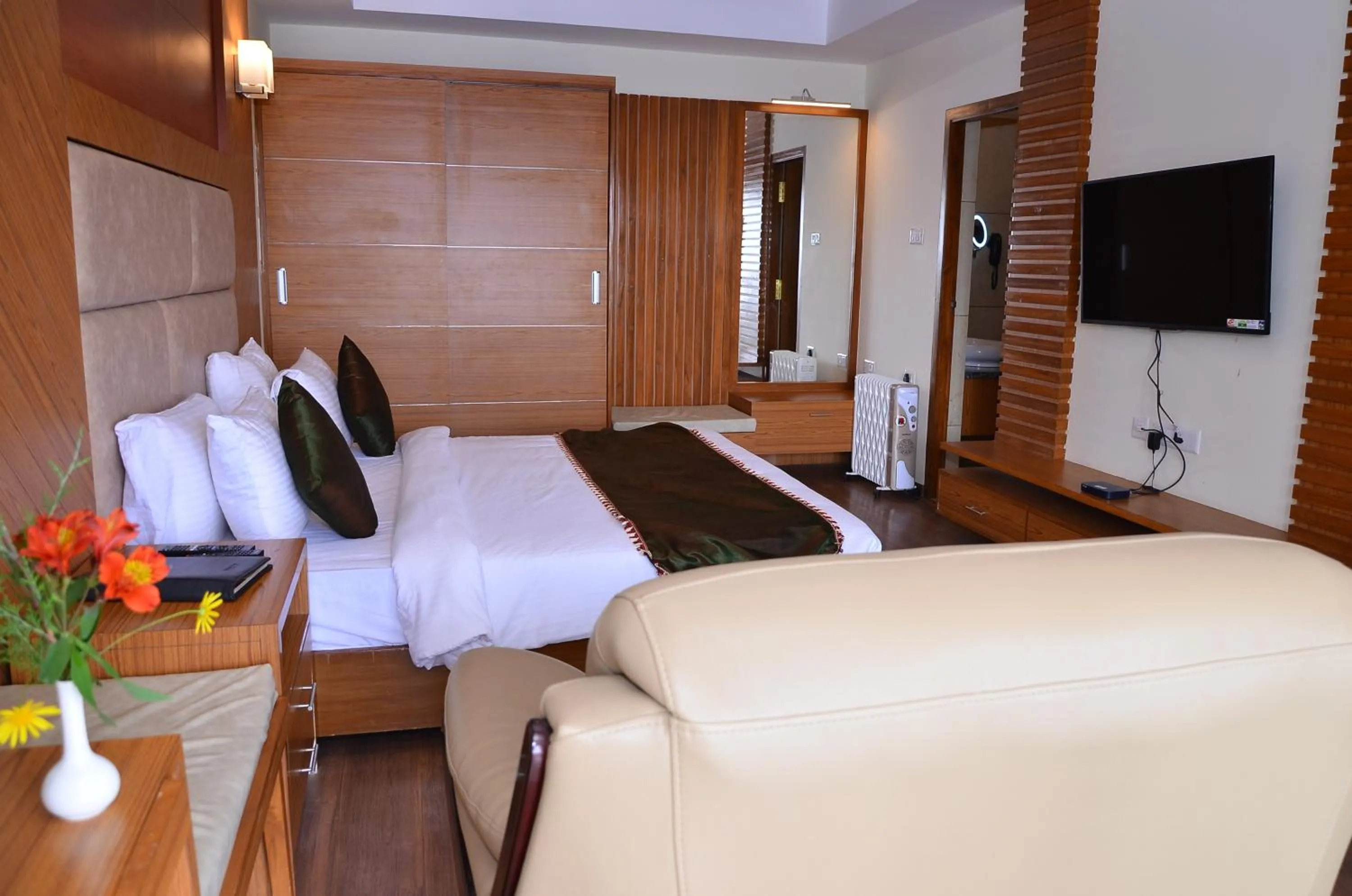 Photo of the whole room, Bed in Benzz Park Family Resort Kodaikanal