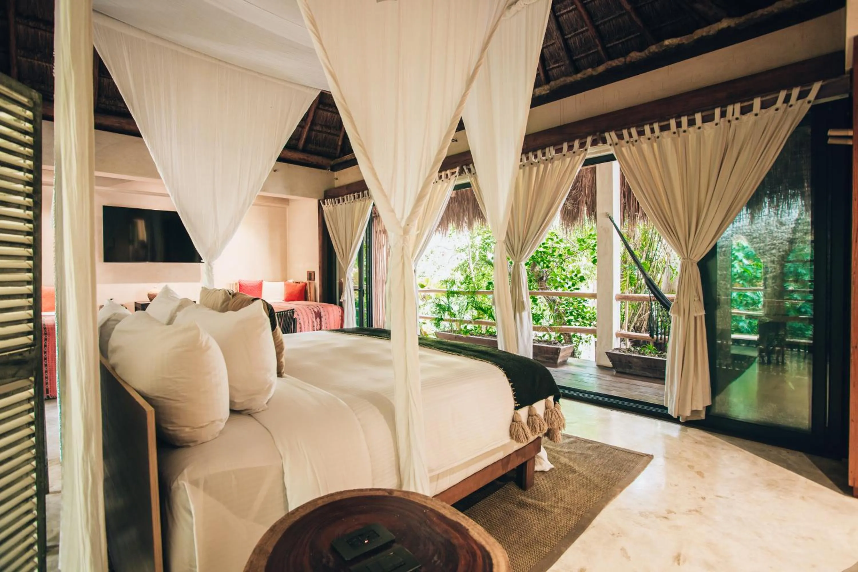 Bed in Orchid House Tulum Jungle