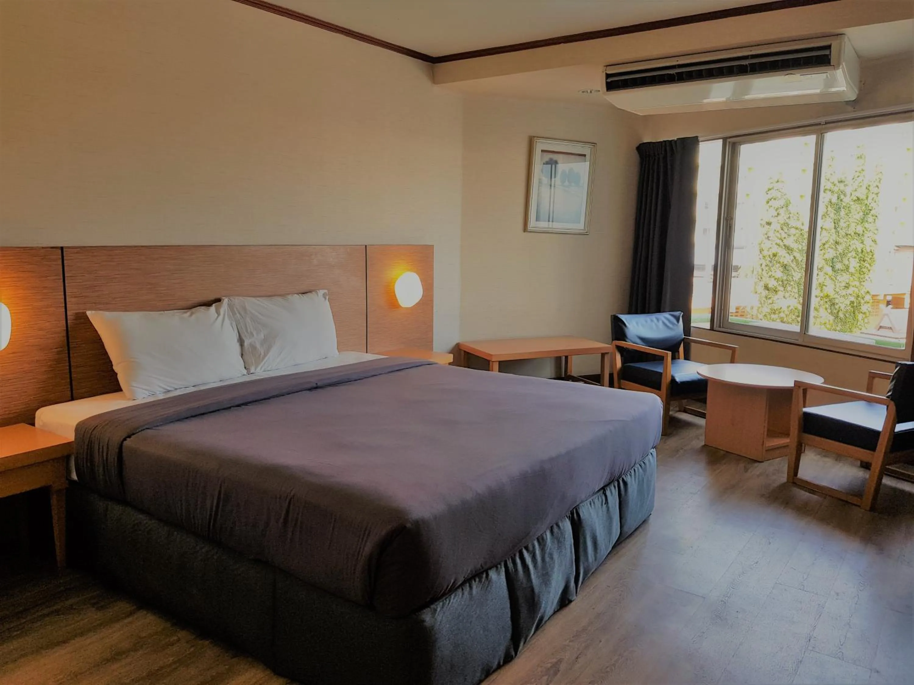 Bed in Marine Plaza Hotel Pattaya