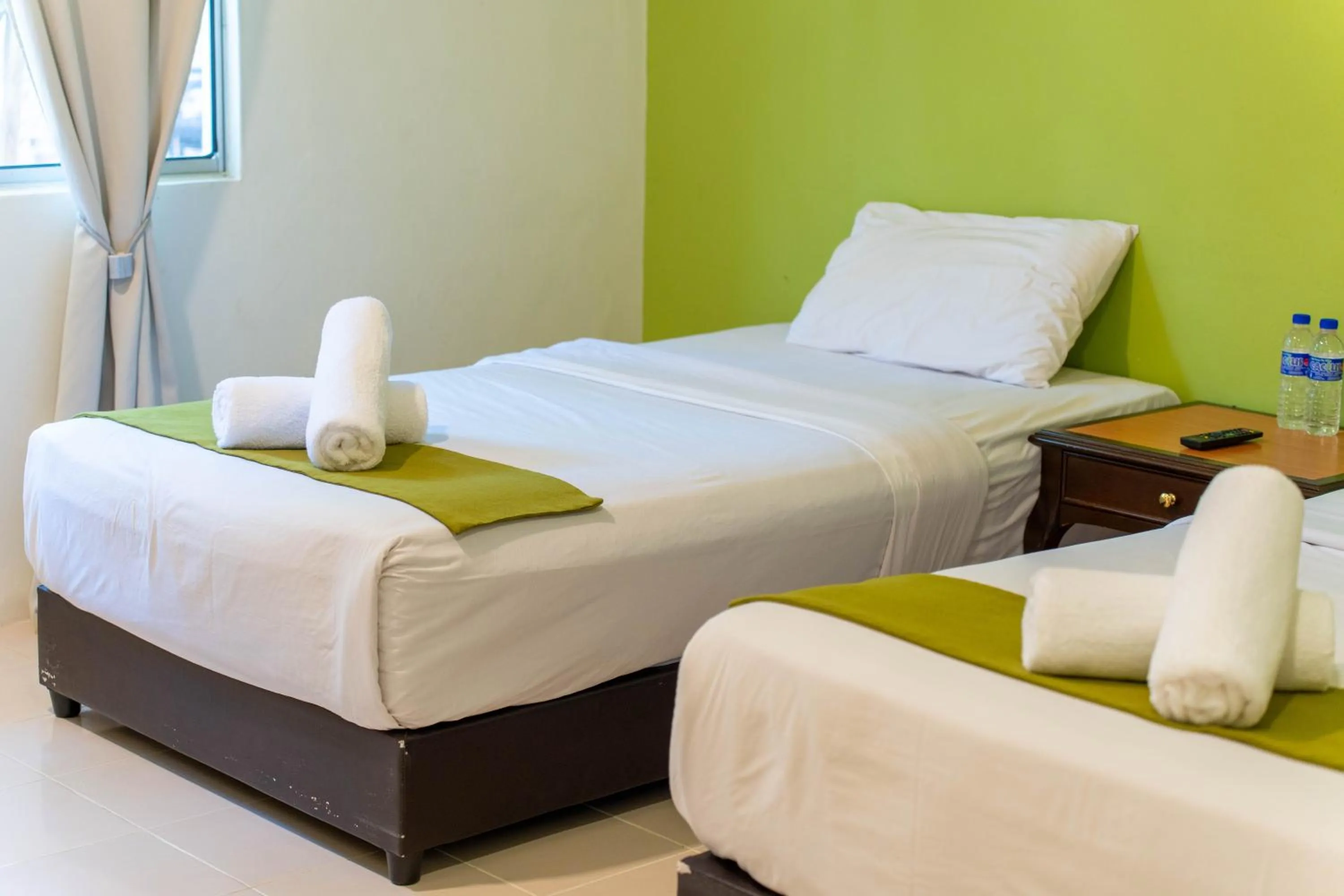 Bed in SANDY GARDEN RESORT LANGKAWI