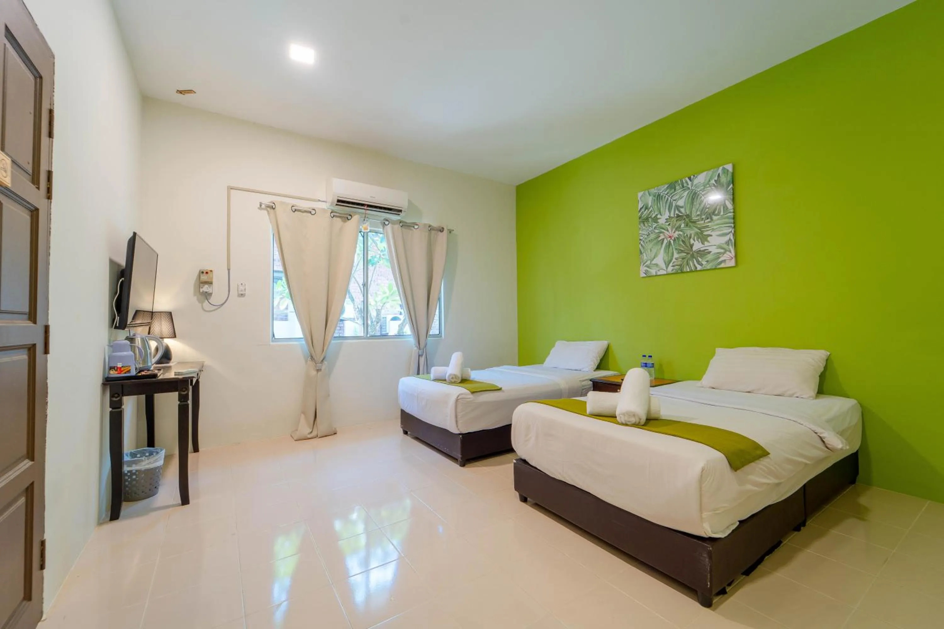 Bed in SANDY GARDEN RESORT LANGKAWI