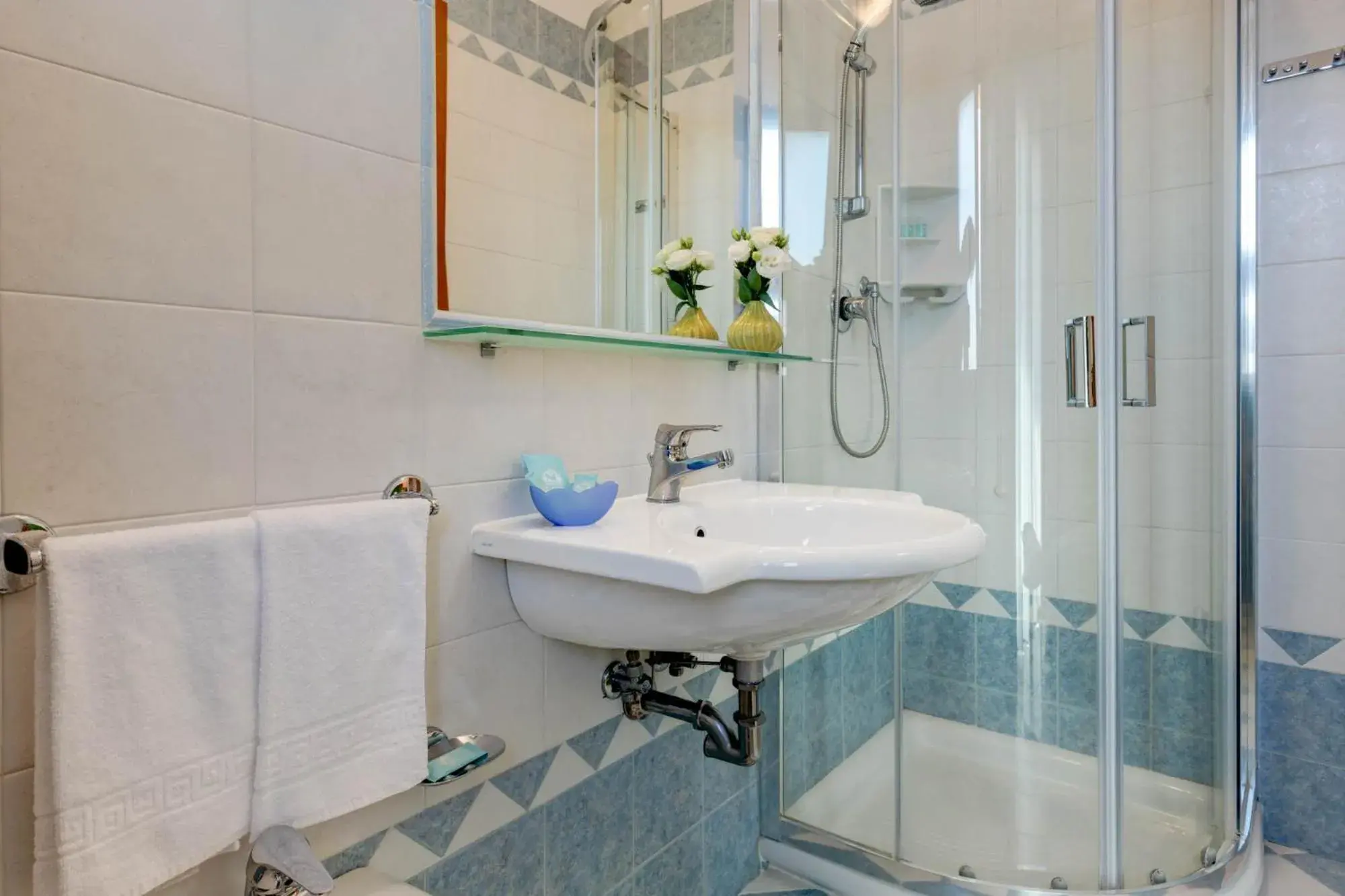 Quadruple Room in Hotel Garni San Carlo Quadruple Room in Hotel Garni San Carlo