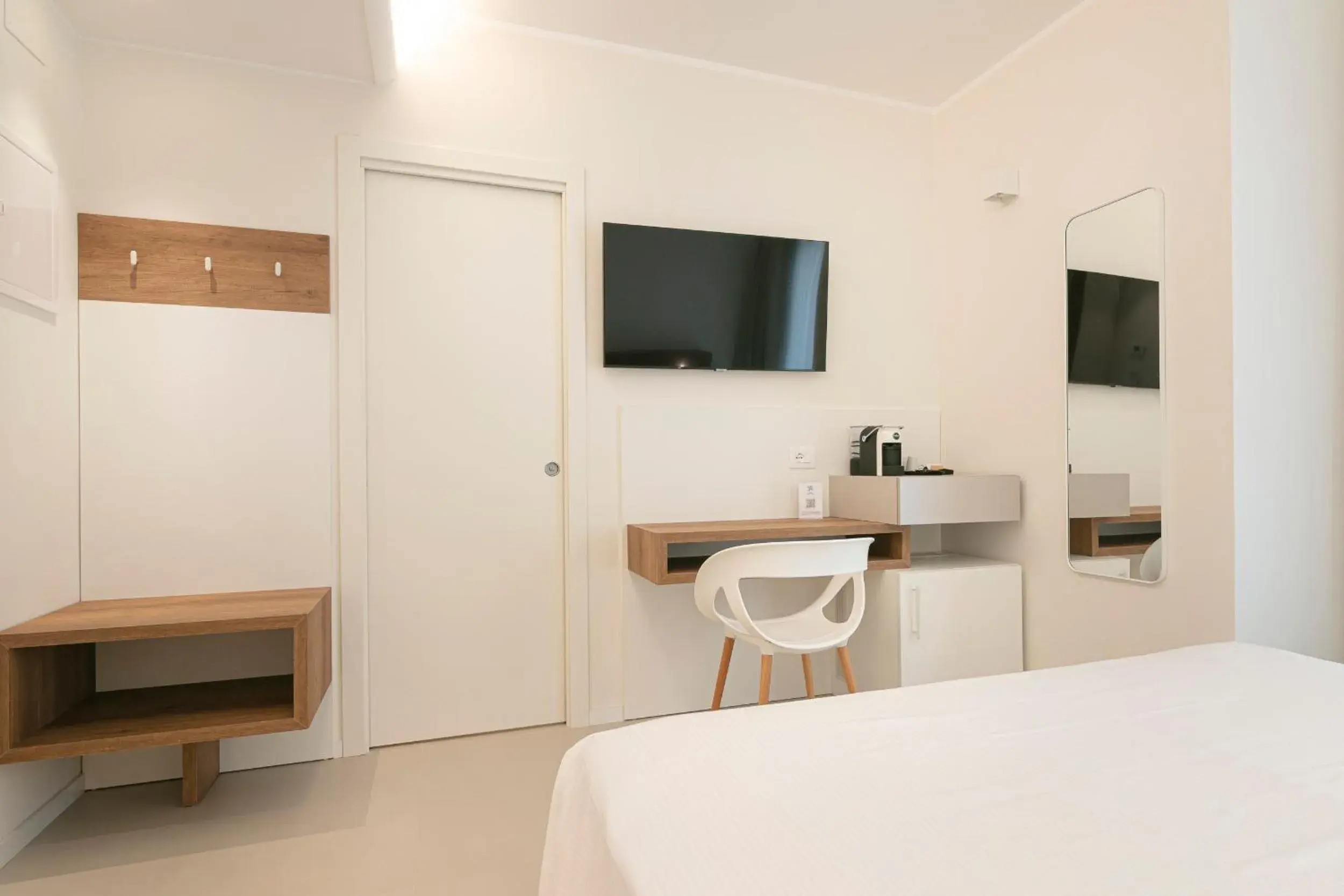 TV and multimedia, Bed in Hotel Mistral TV and multimedia, Bed in Hotel Mistral