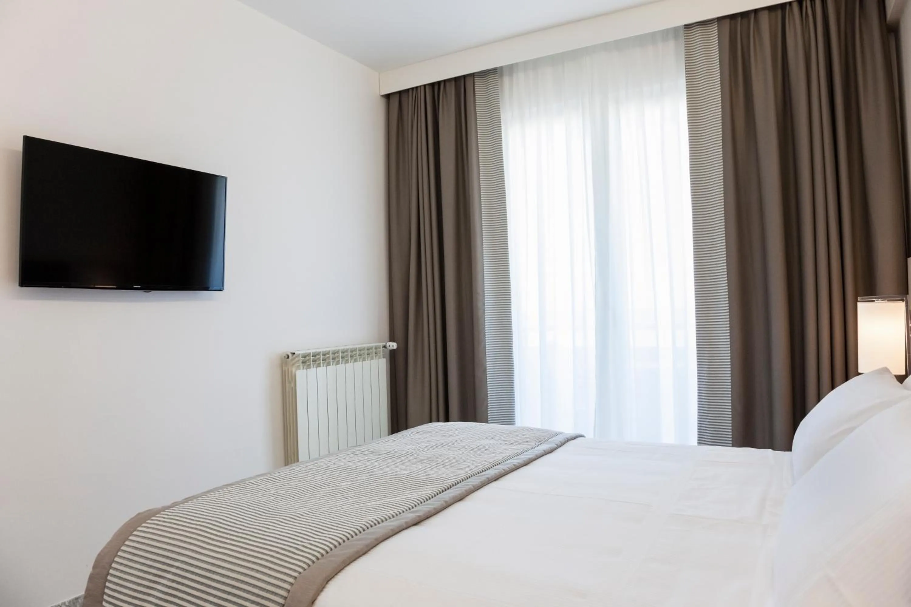 Bed in Hotel Mistral