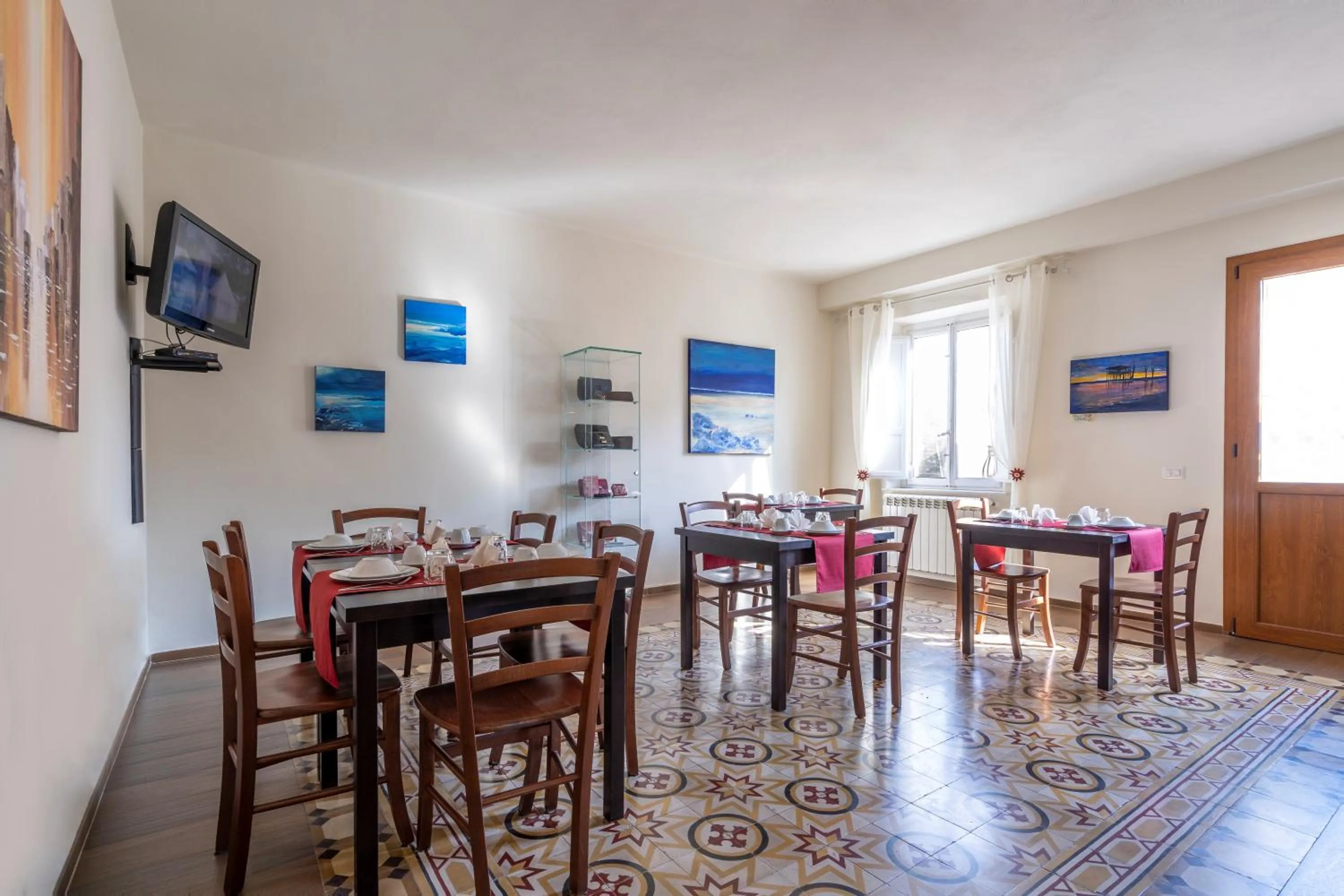 Communal lounge/ TV room in B&B Alma