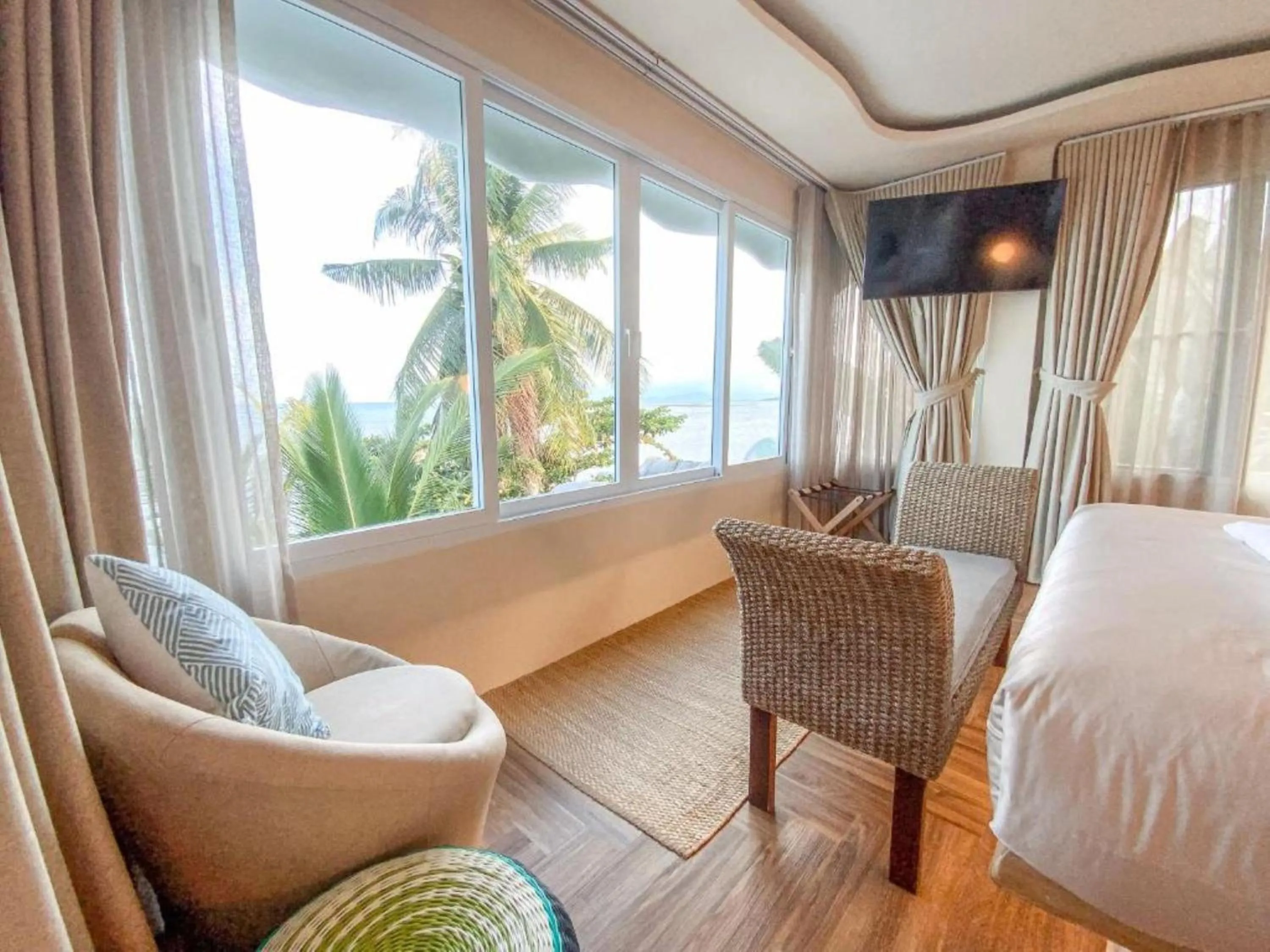 Seating area, Bed in The Rock Samui Beach Resort