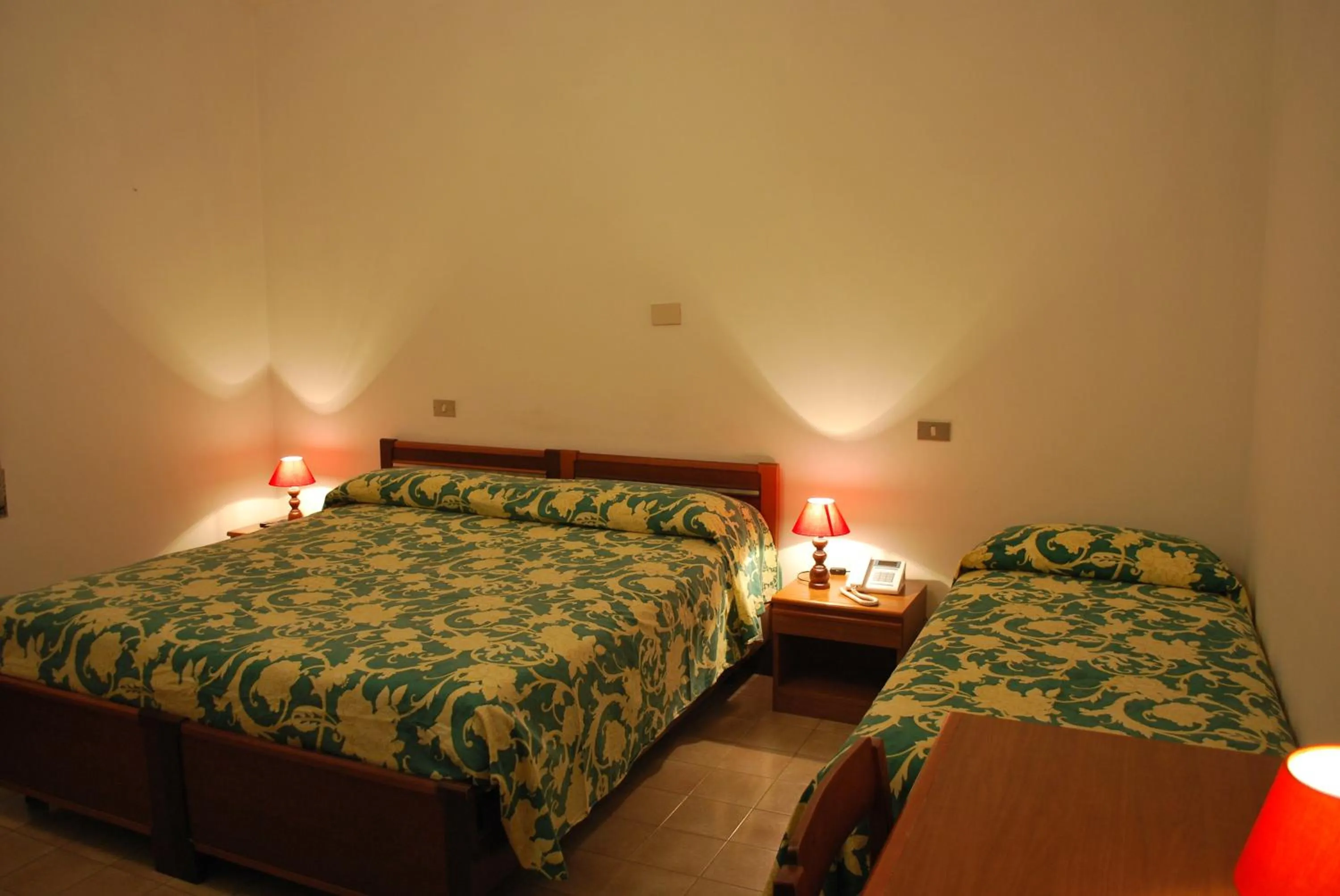 Bed in Albergo Smeraldo