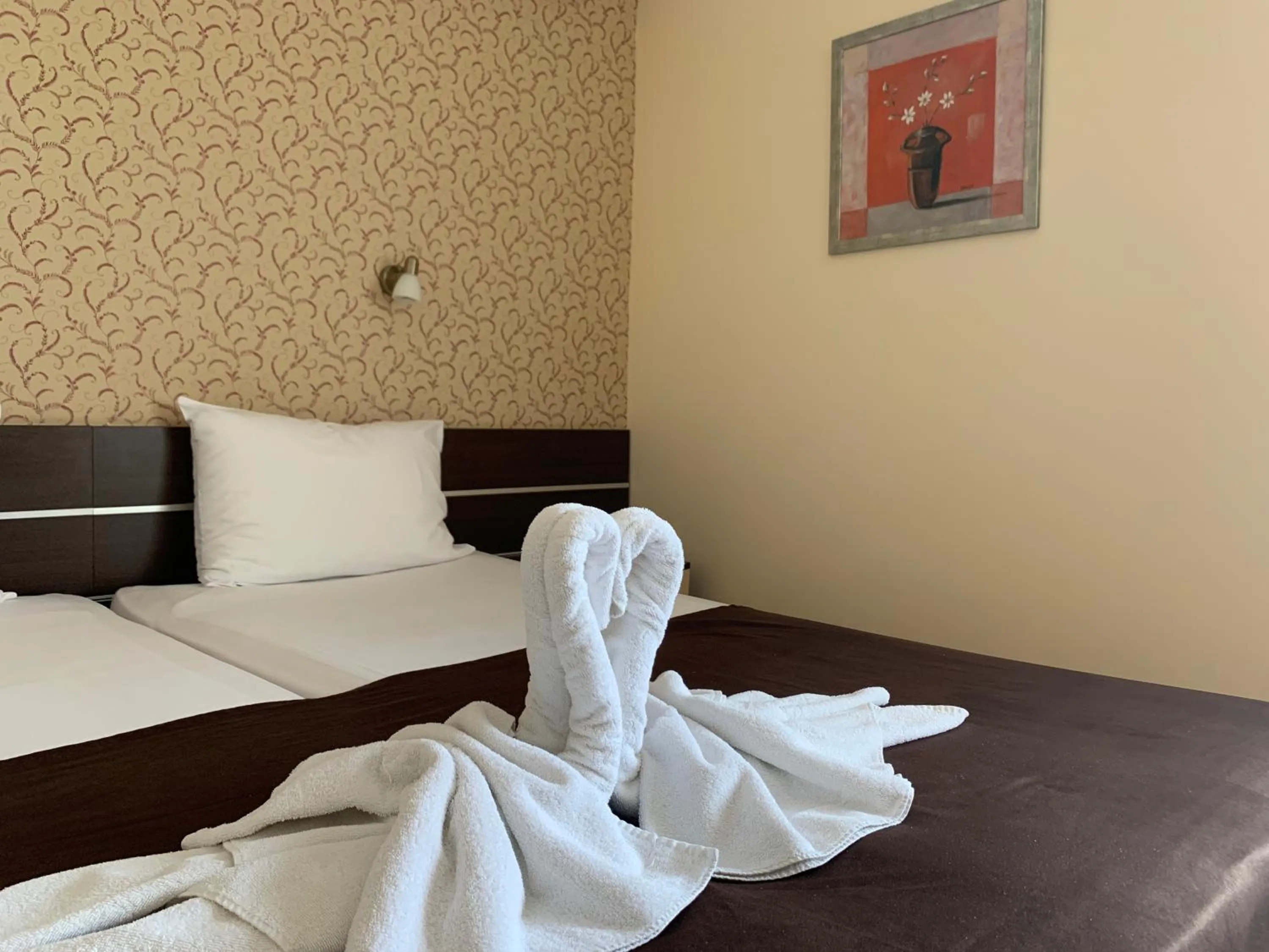 Bed in Family Hotel Piter