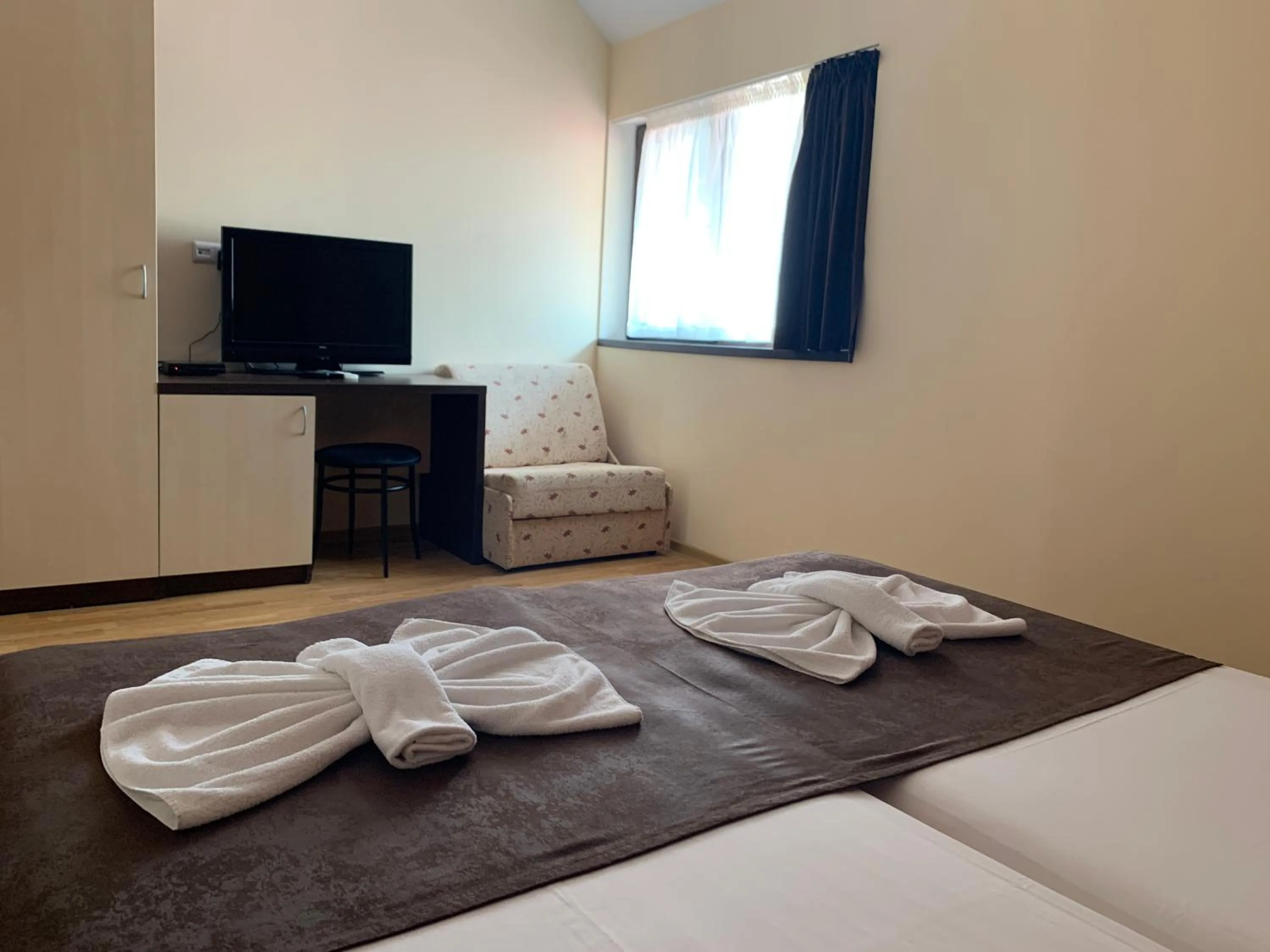 Bed in Family Hotel Piter