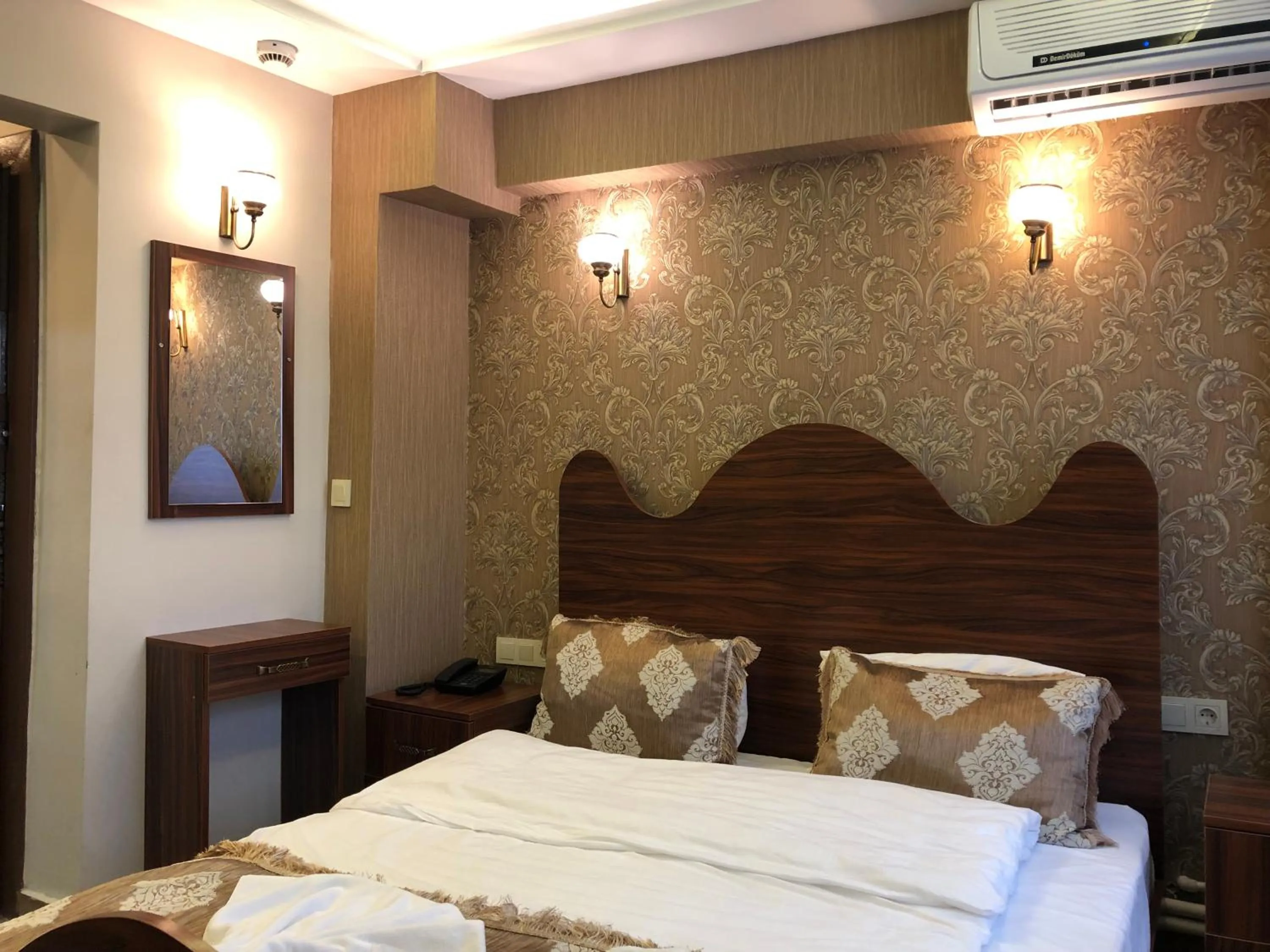 Bedroom, Bed in Capricorn by Otantik Suites