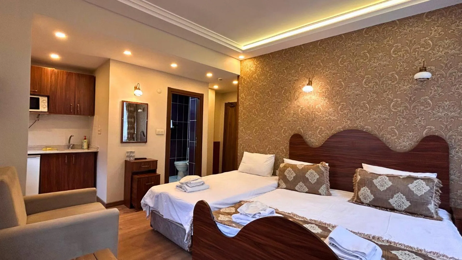 Photo of the whole room, Bed in Capricorn by Otantik Suites