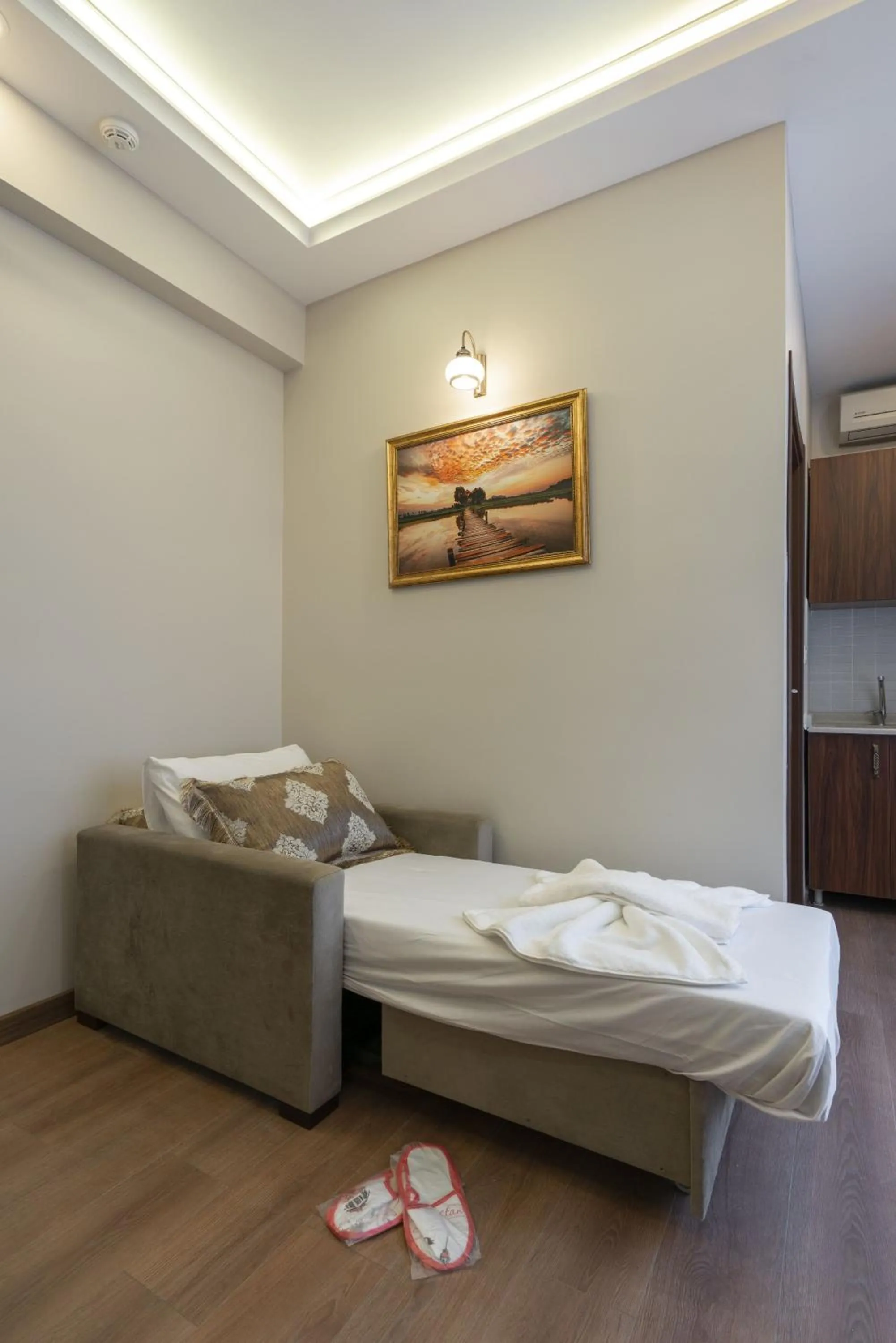 Living room, Bed in Capricorn by Otantik Suites