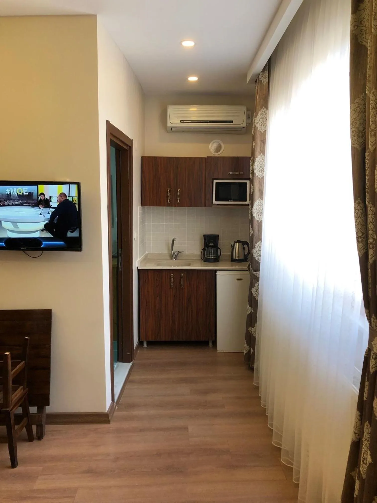 Kitchen or kitchenette in Capricorn by Otantik Suites