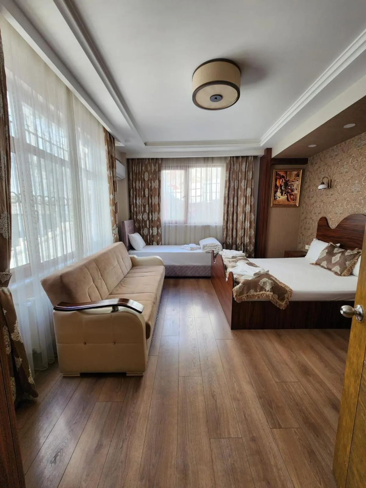 Photo of the whole room, Bed in Capricorn by Otantik Suites