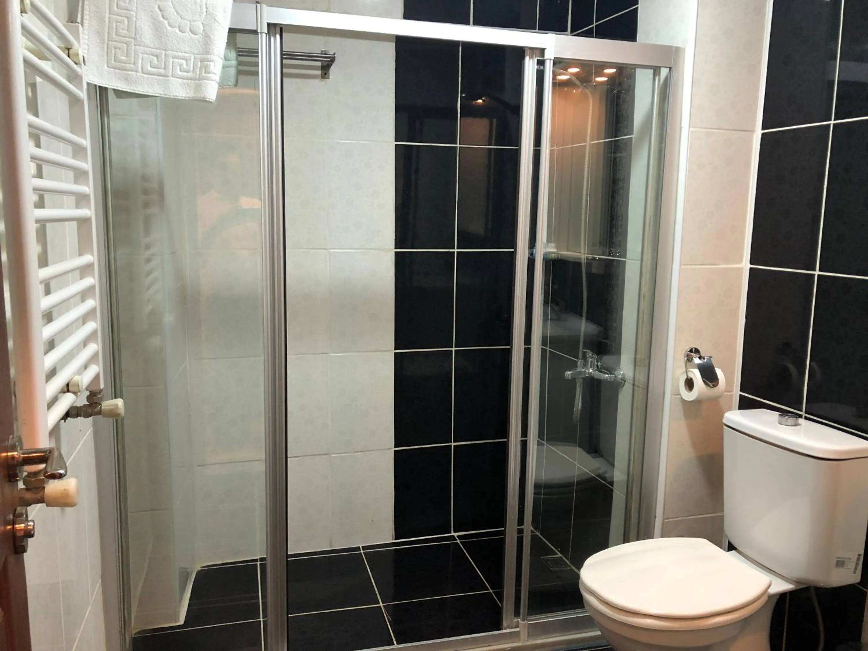 Bathroom in Capricorn by Otantik Suites