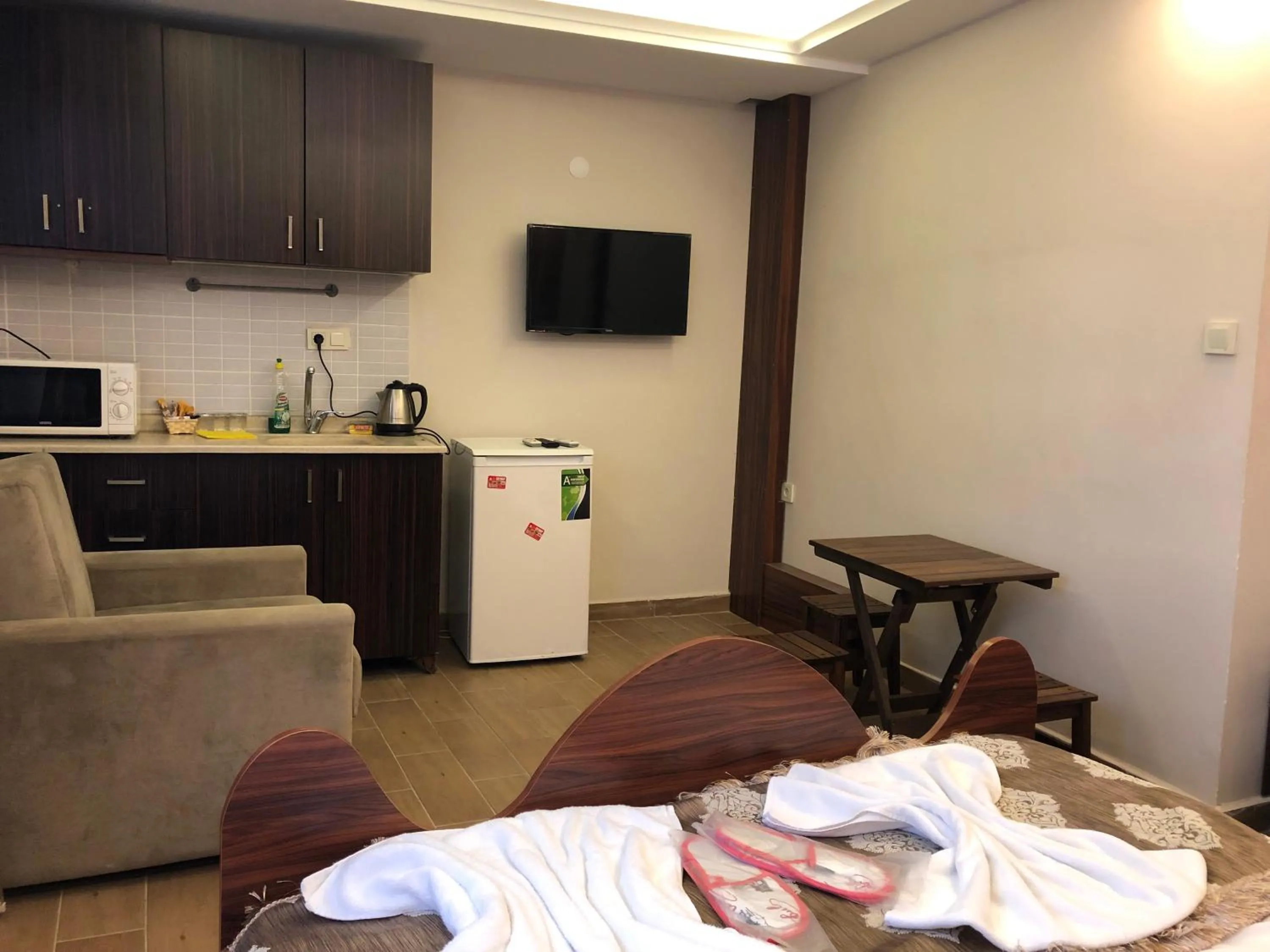 Kitchen or kitchenette in Capricorn by Otantik Suites