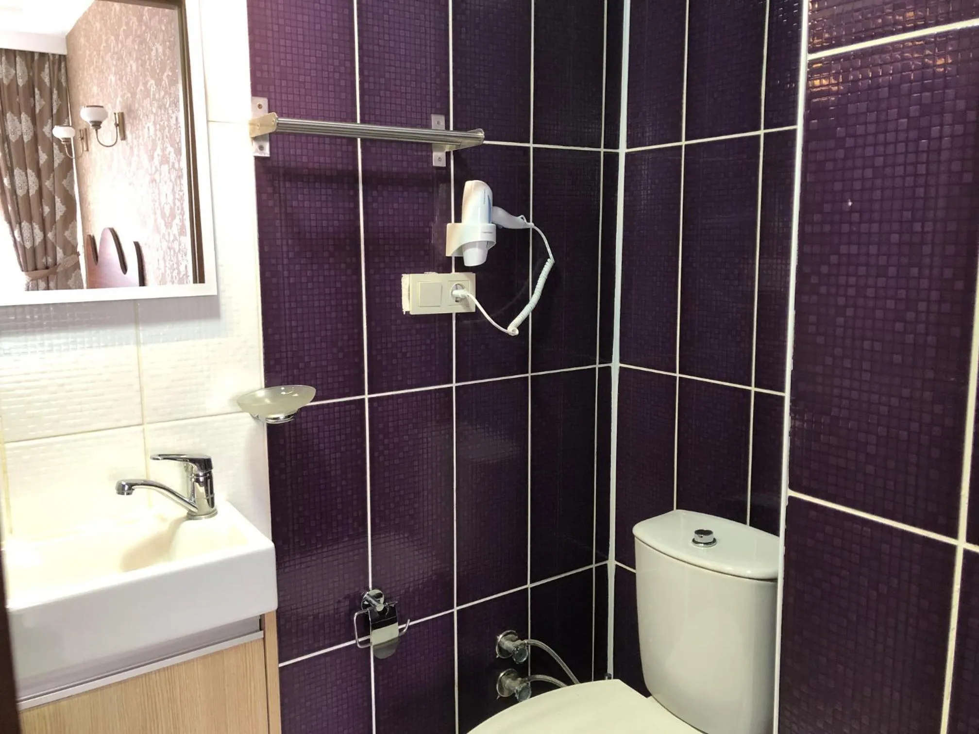 Bathroom in Capricorn by Otantik Suites