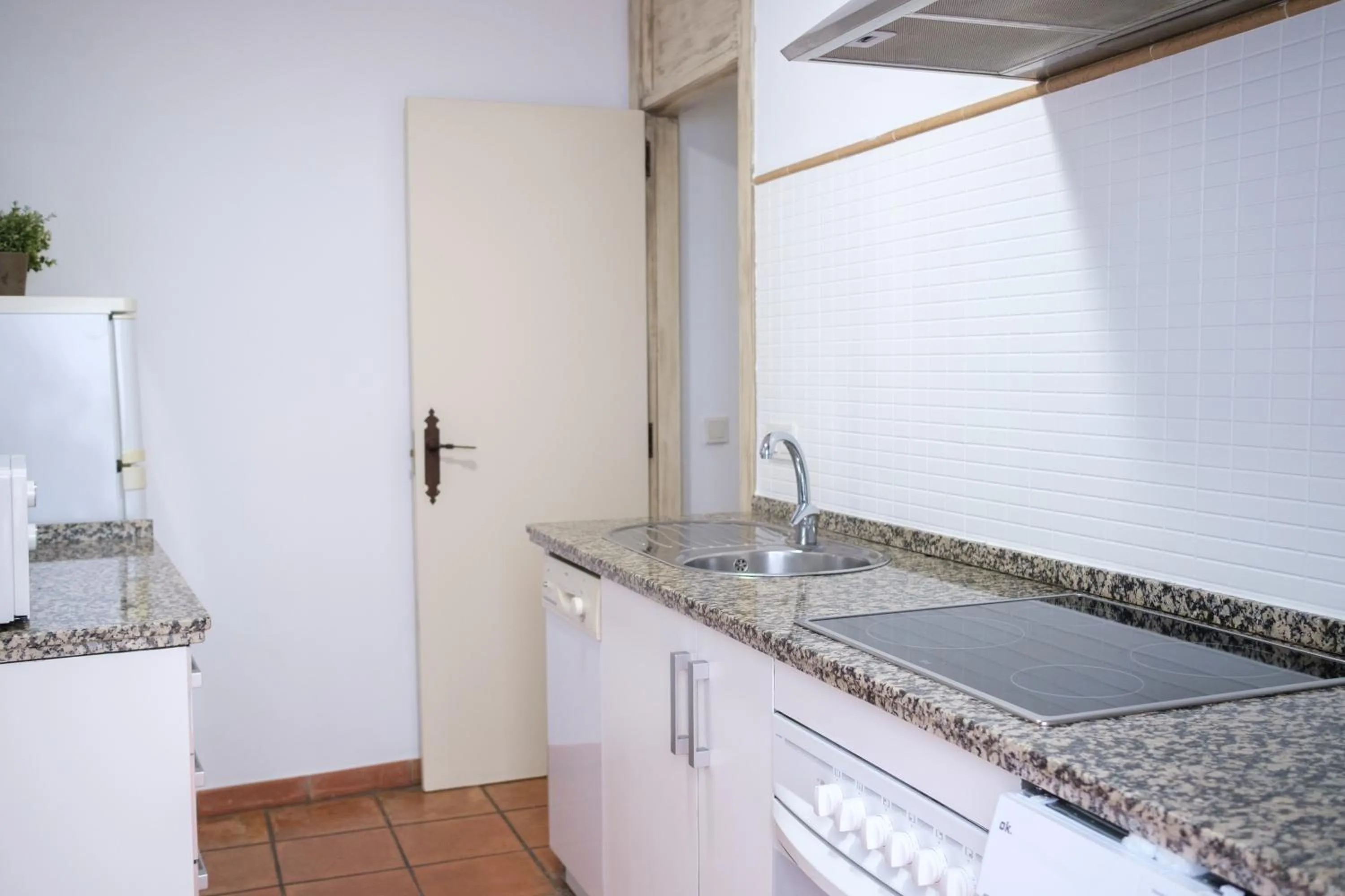 Kitchen or kitchenette in Apartamentos Los Patios de la Judería