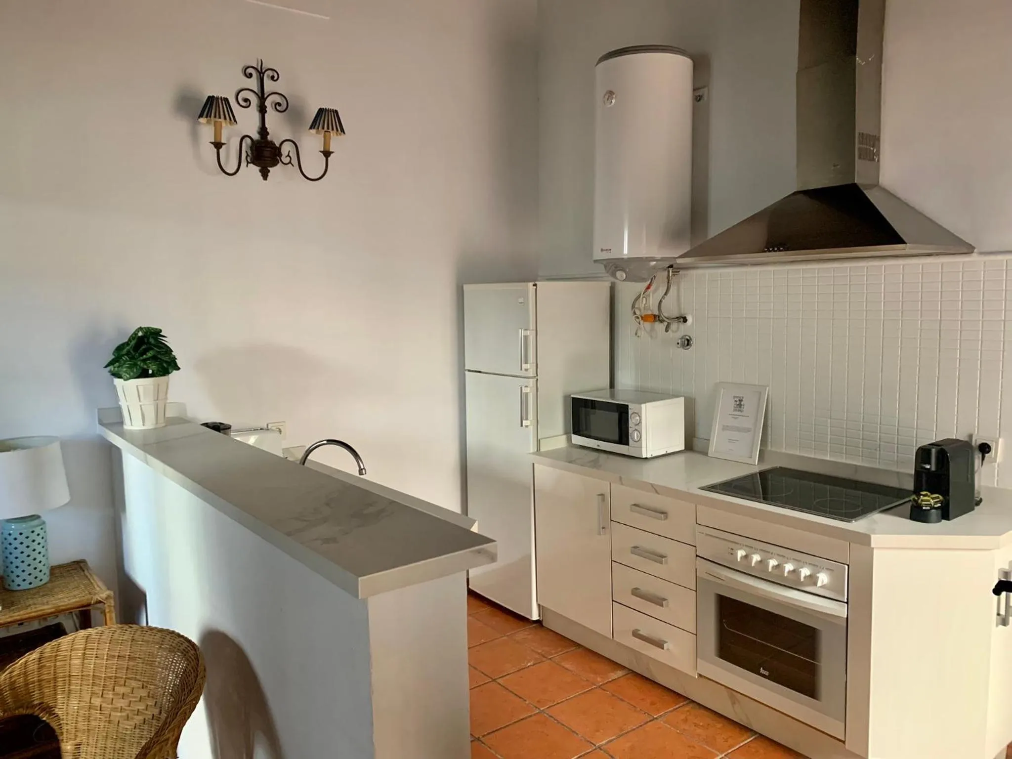 Kitchen or kitchenette in Apartamentos Los Patios de la Judería