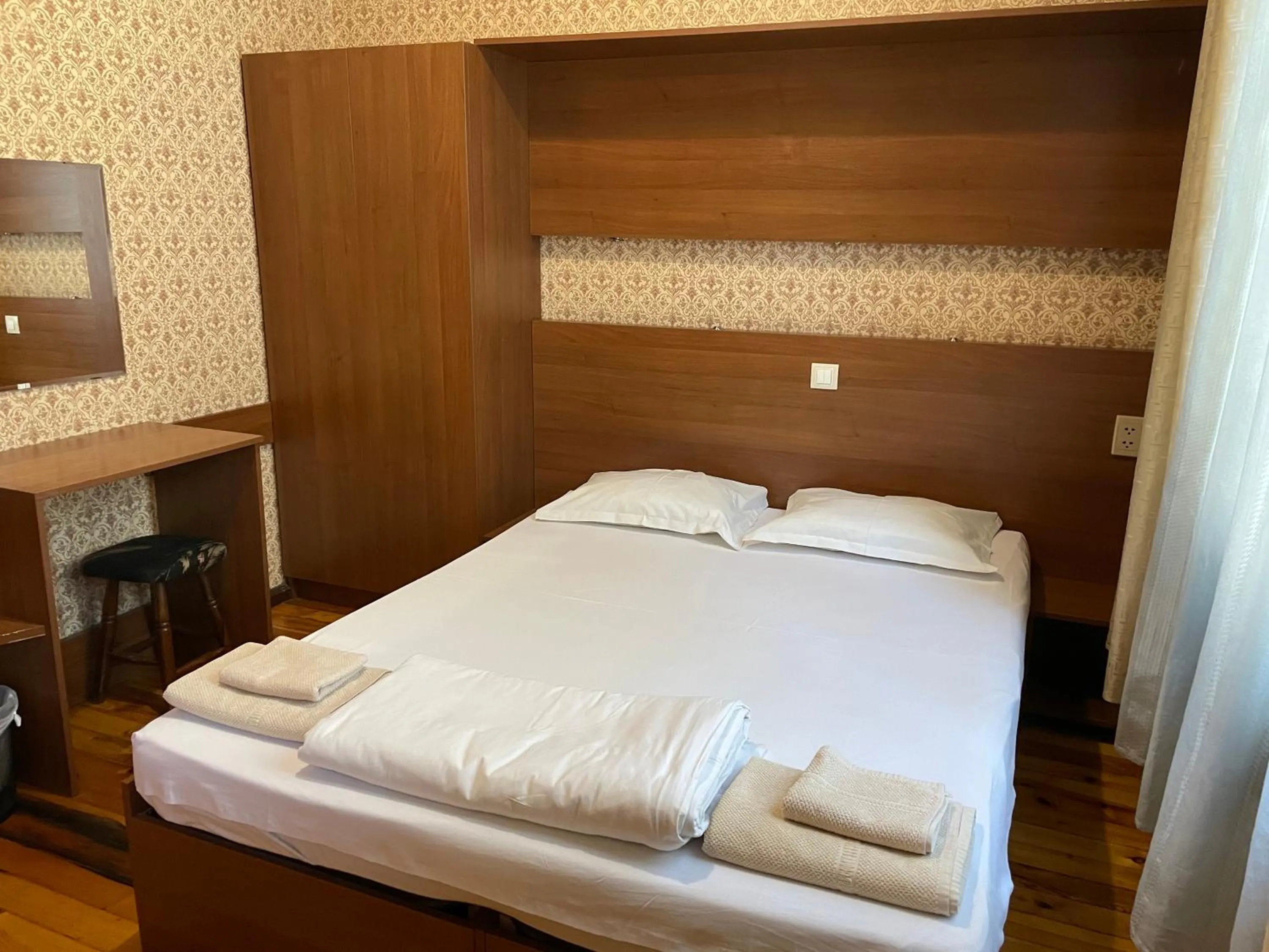 Bed in Pop Bogomil family hotel
