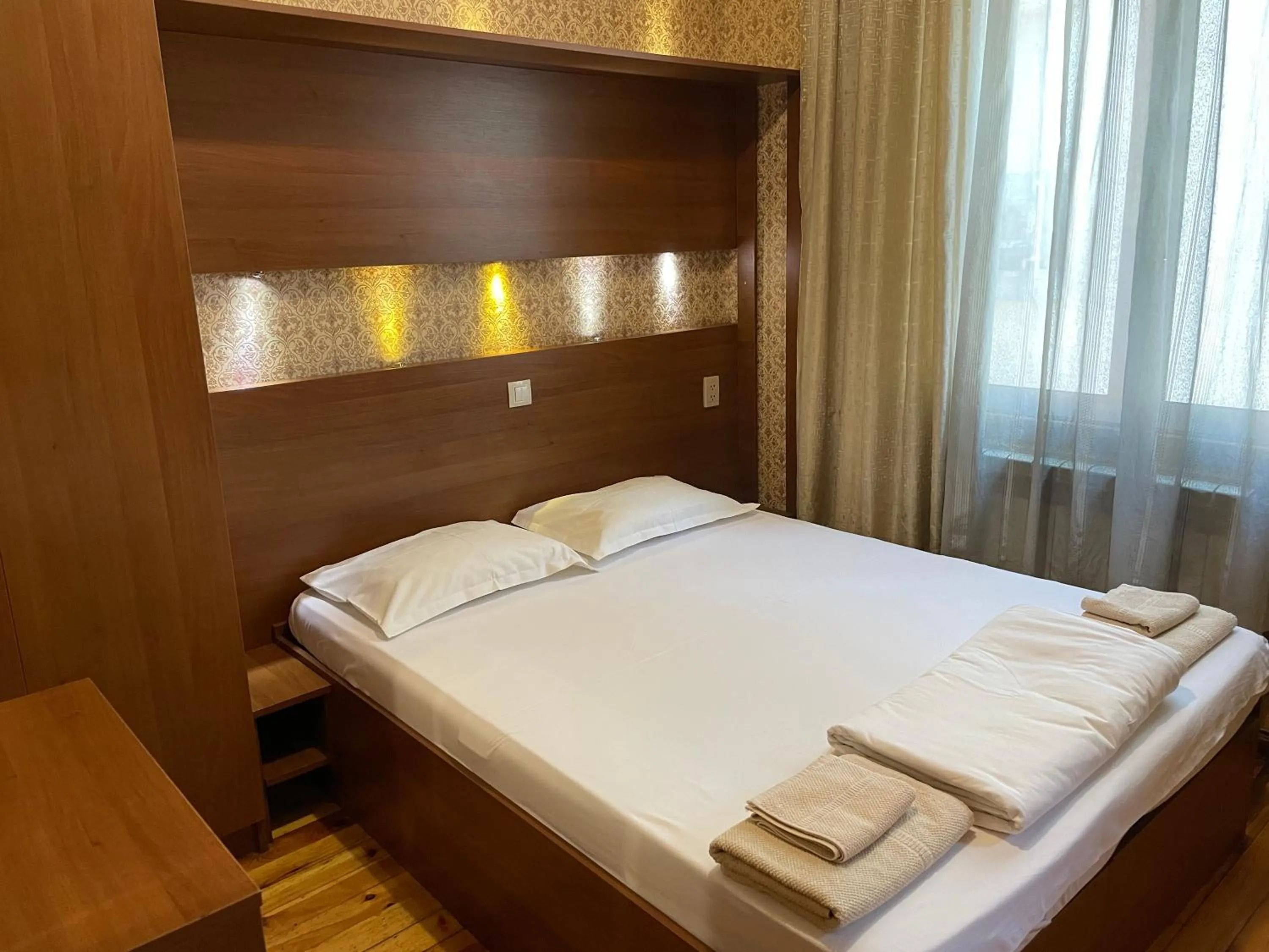 Bed in Pop Bogomil family hotel