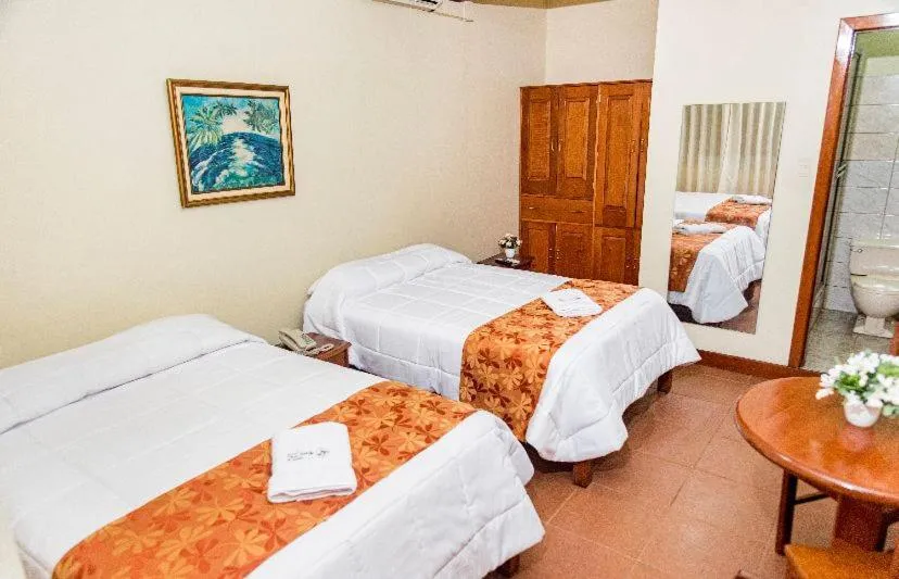 Bed in Hotel Oro Verde & Suites
