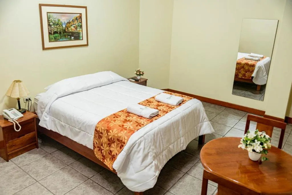 Bed in Hotel Oro Verde & Suites