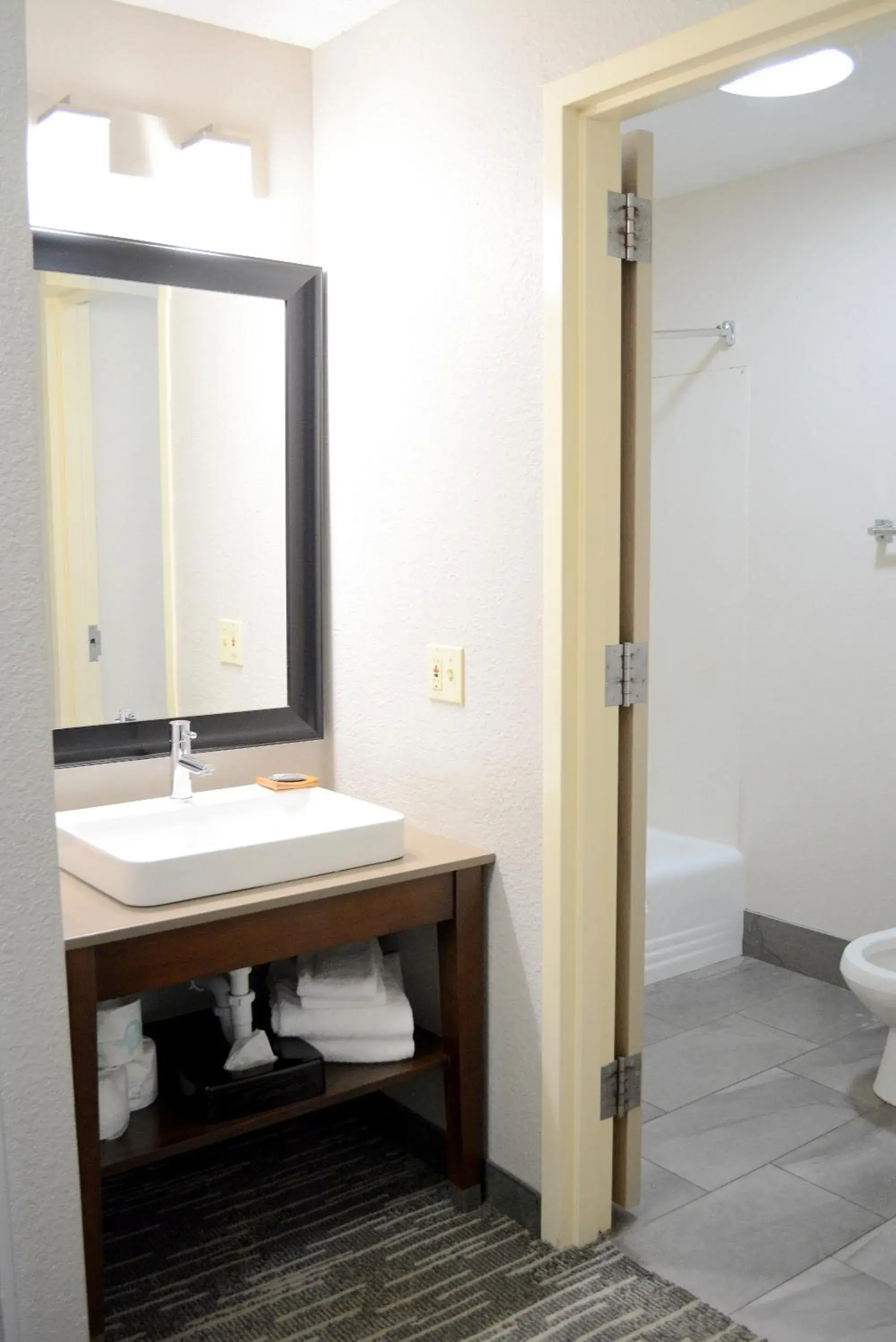 Bathroom in Country Inn & Suites by Radisson, Port Clinton, OH Bathroom in Country Inn & Suites by Radisson, Port Clinton, OH