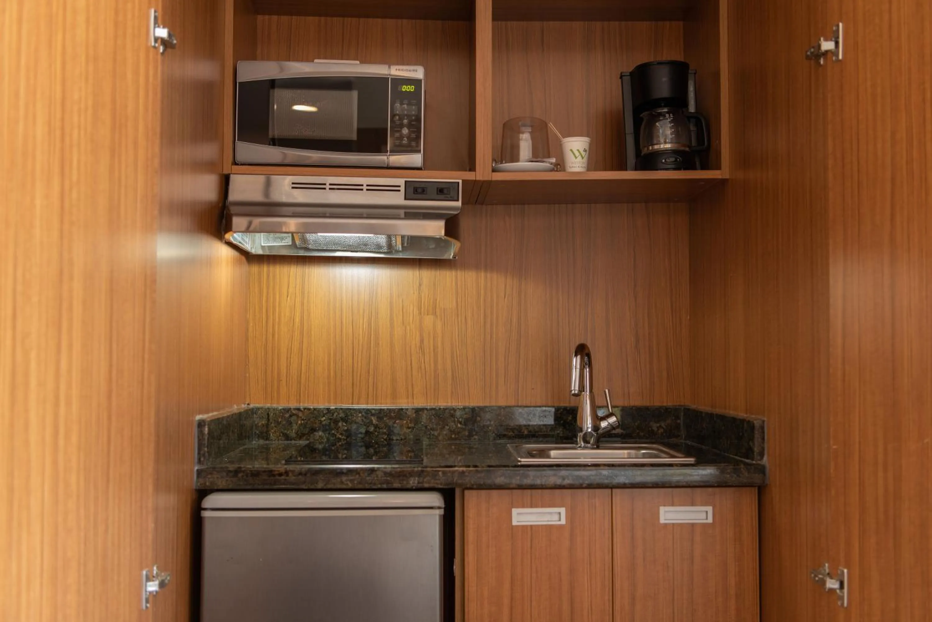 Kitchen or kitchenette in Weston Suites Hotel