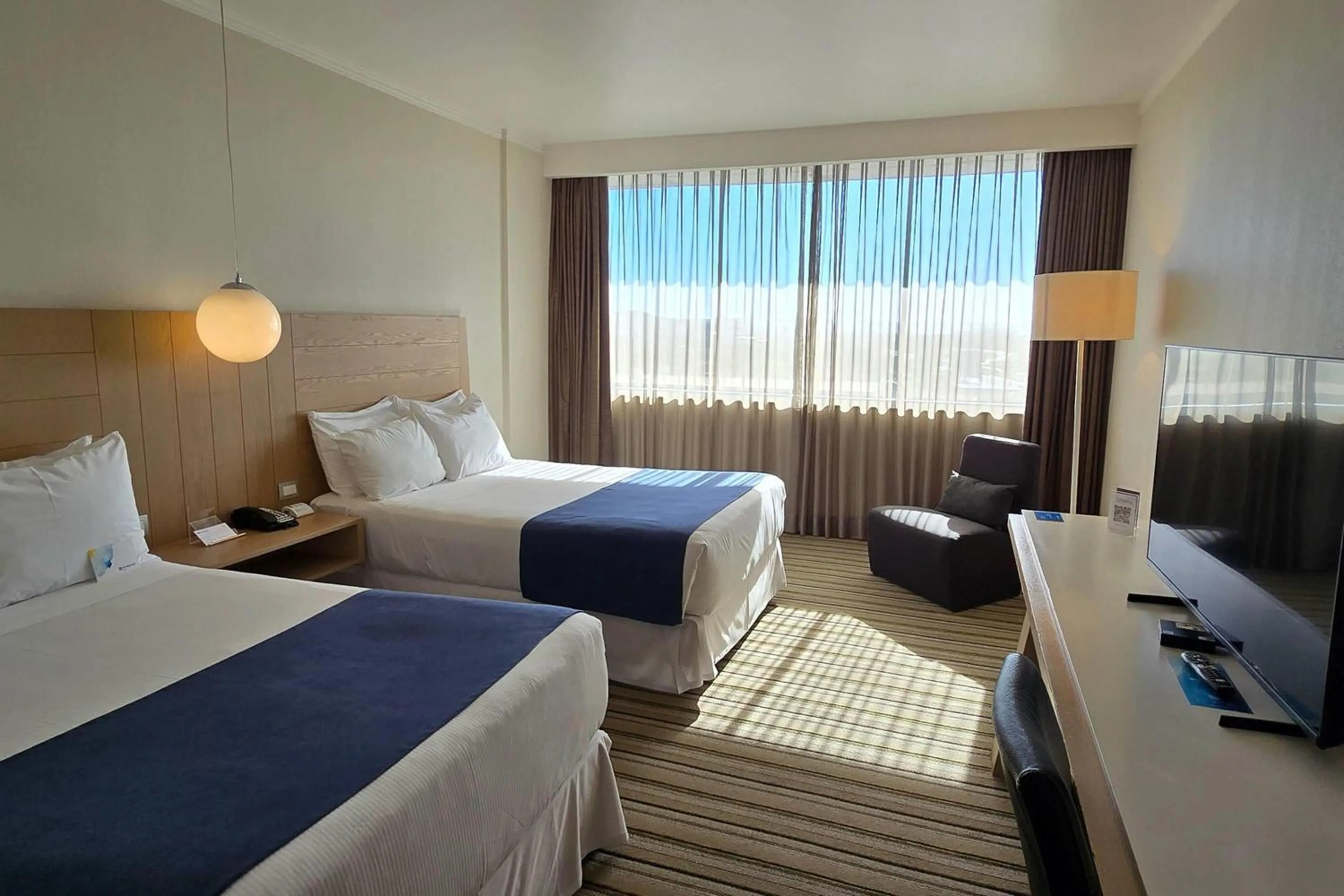 Photo of the whole room, Bed in Wyndham Concepcion Pettra