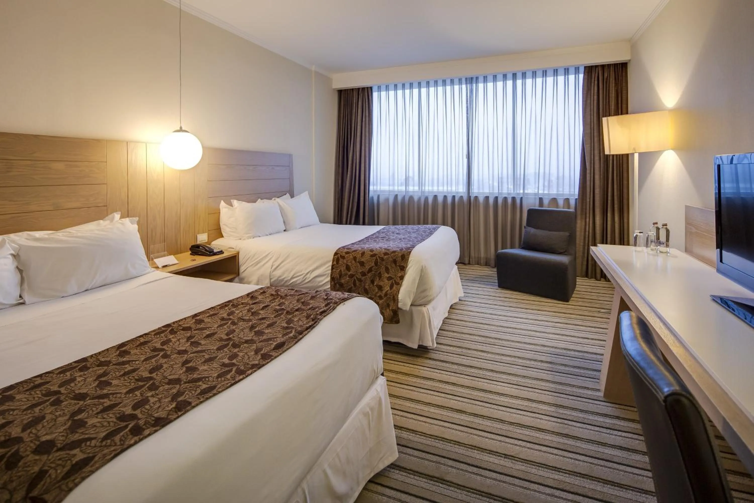 Bed in Wyndham Concepcion Pettra