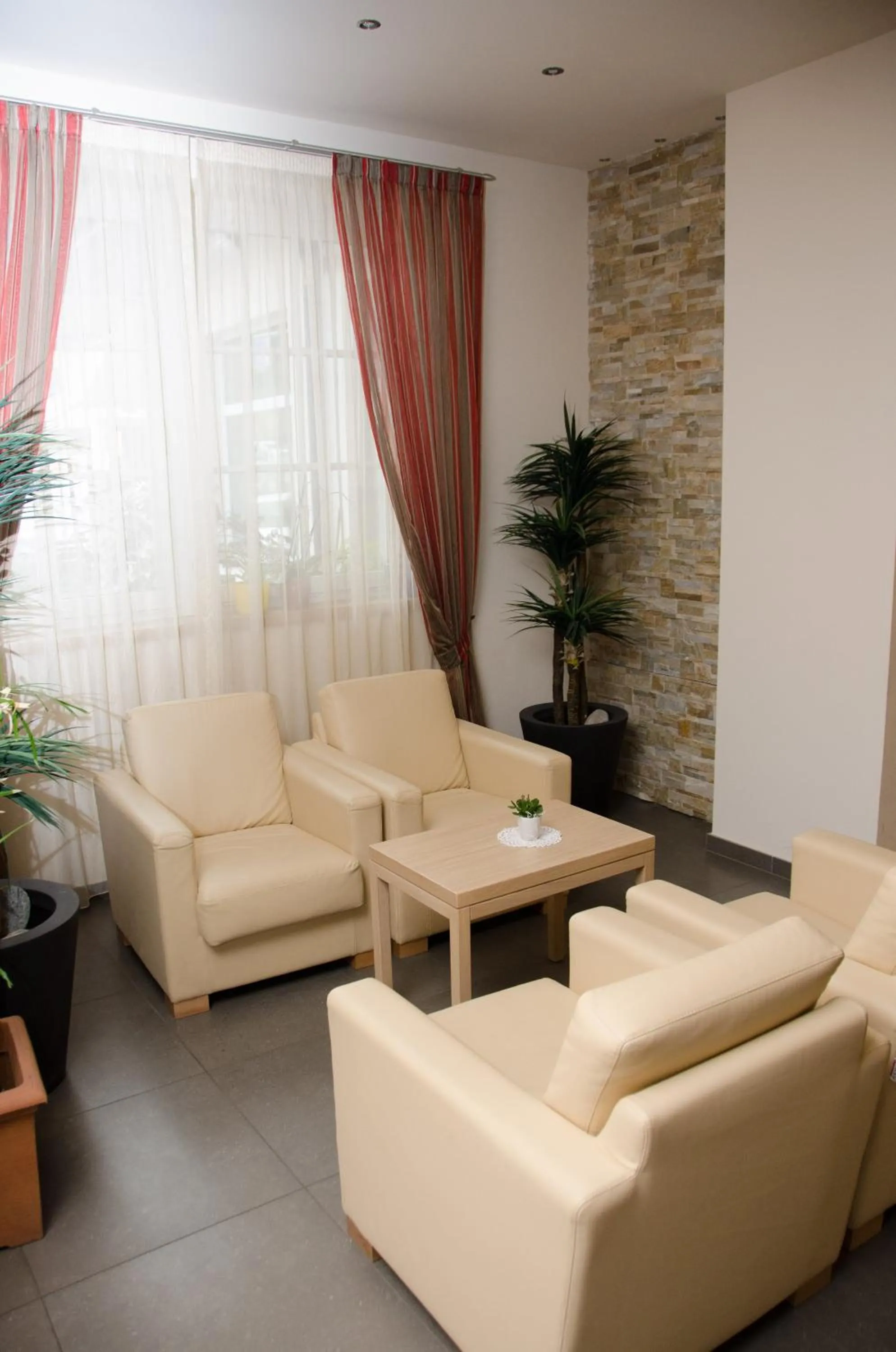 Communal lounge/ TV room in Hotel Bel Sit