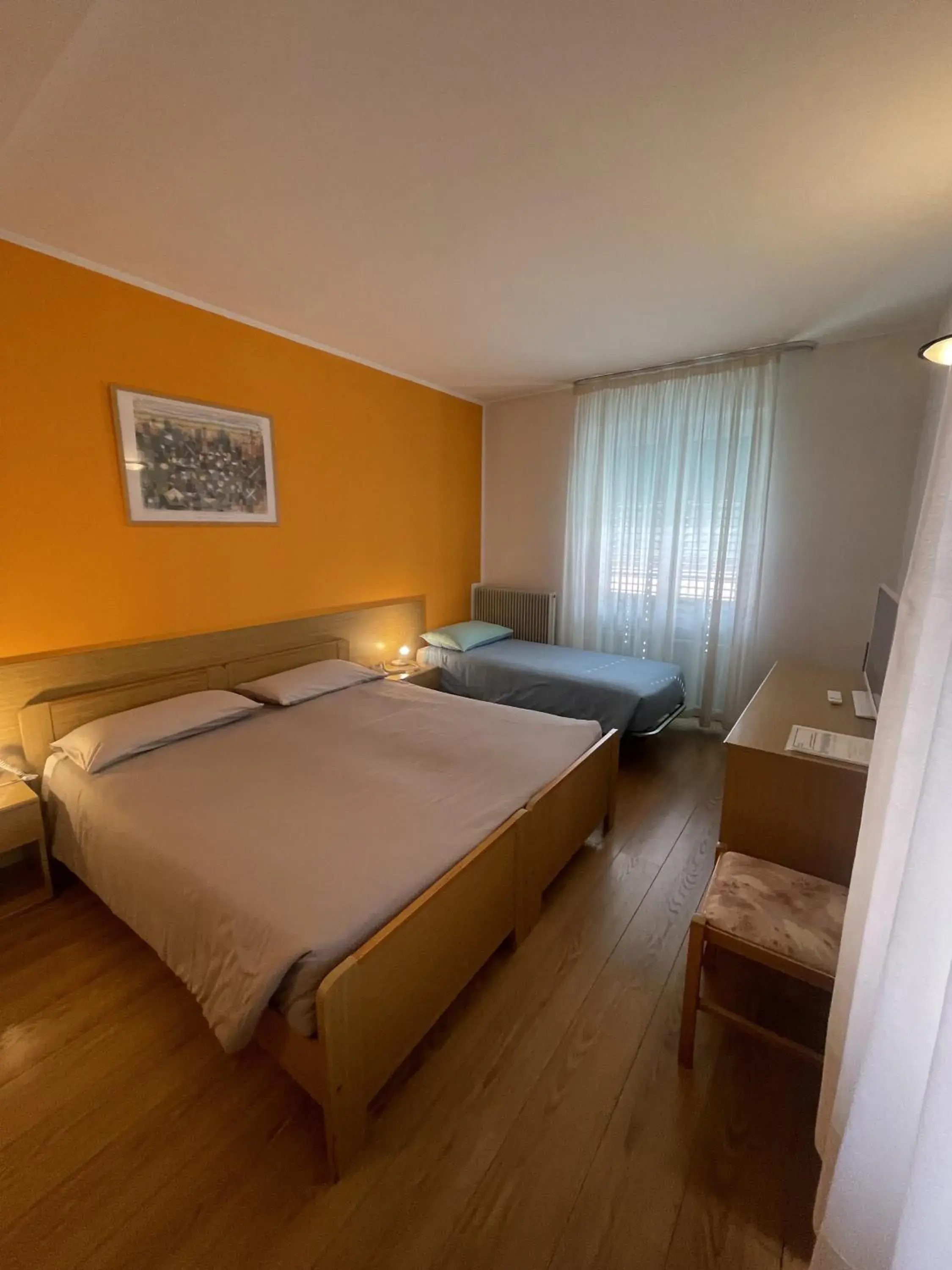 Deluxe Triple Room in Hotel Bel Sit Deluxe Triple Room in Hotel Bel Sit