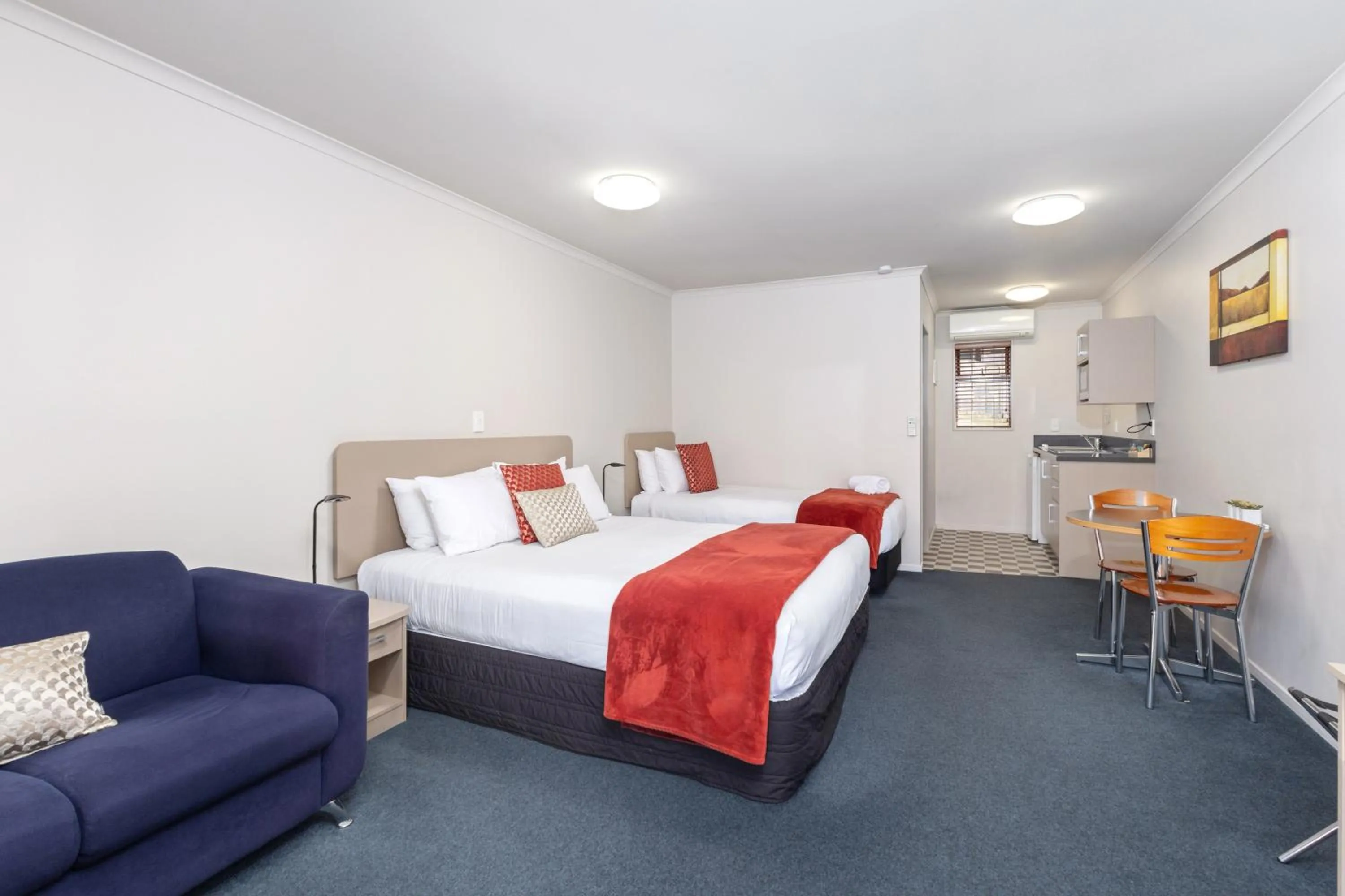 Bed in ASURE Scenic Route Motor Lodge