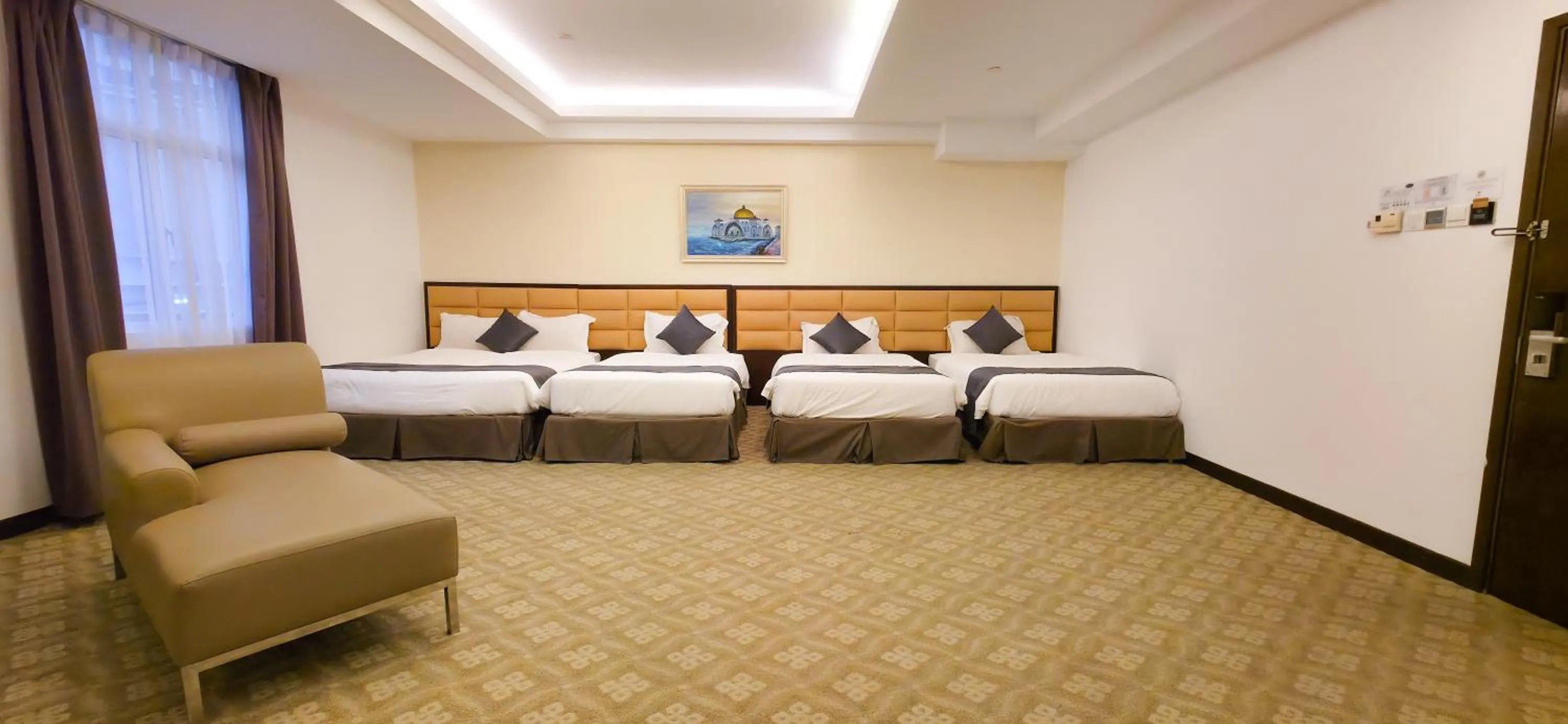 Bedroom in Hallmark Crown Hotel