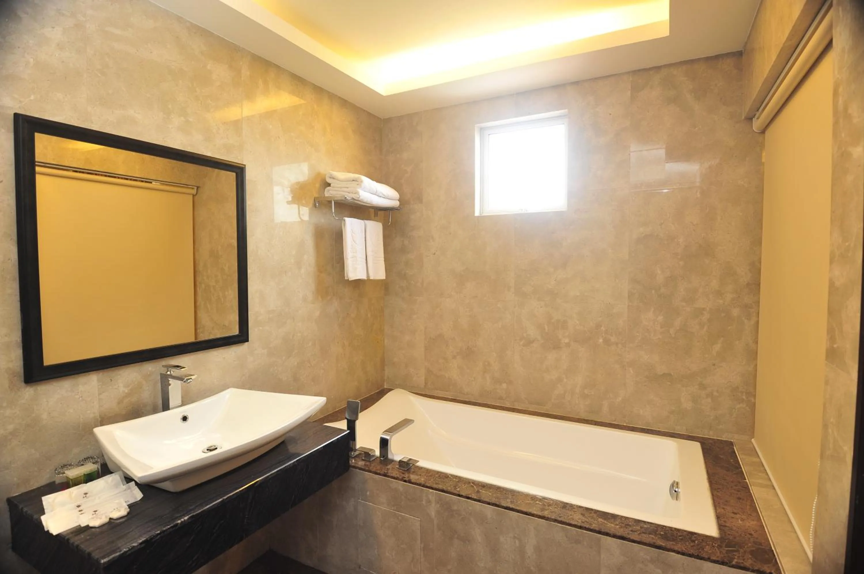 Bathroom in Hallmark Crown Hotel