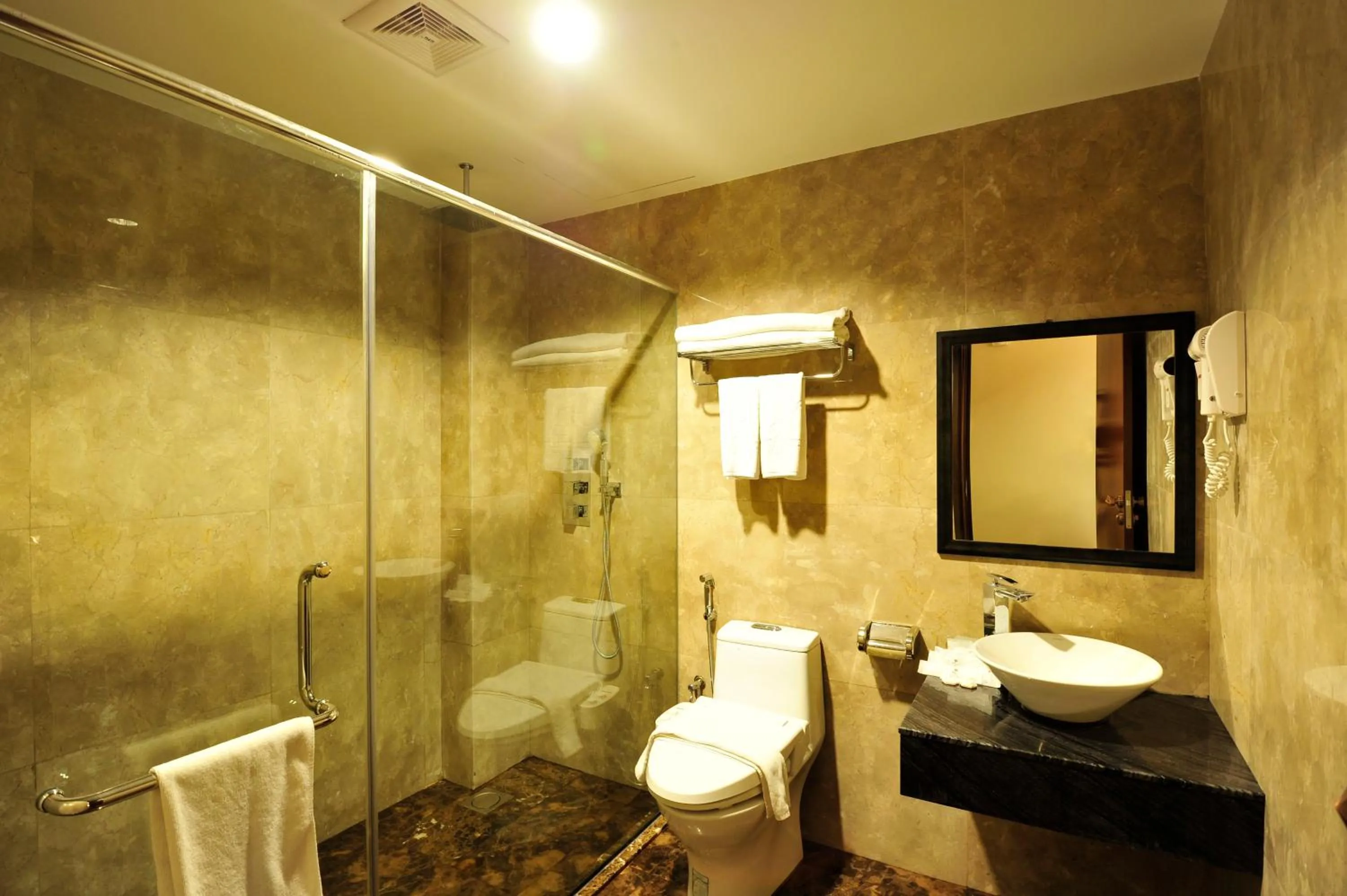 Bathroom in Hallmark Crown Hotel