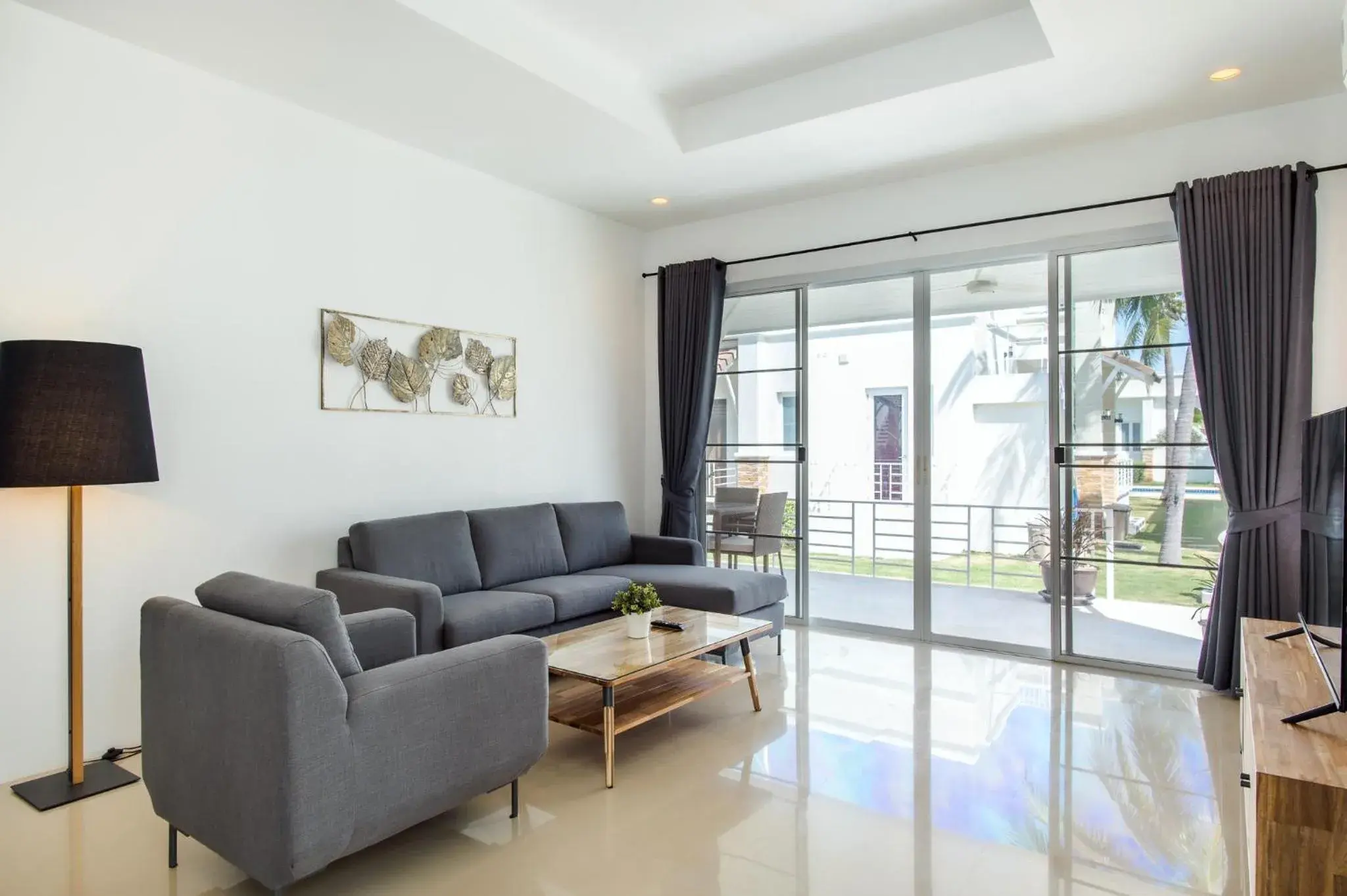 Living room in Oriental Beach Pearl Resort Living room in Oriental Beach Pearl Resort