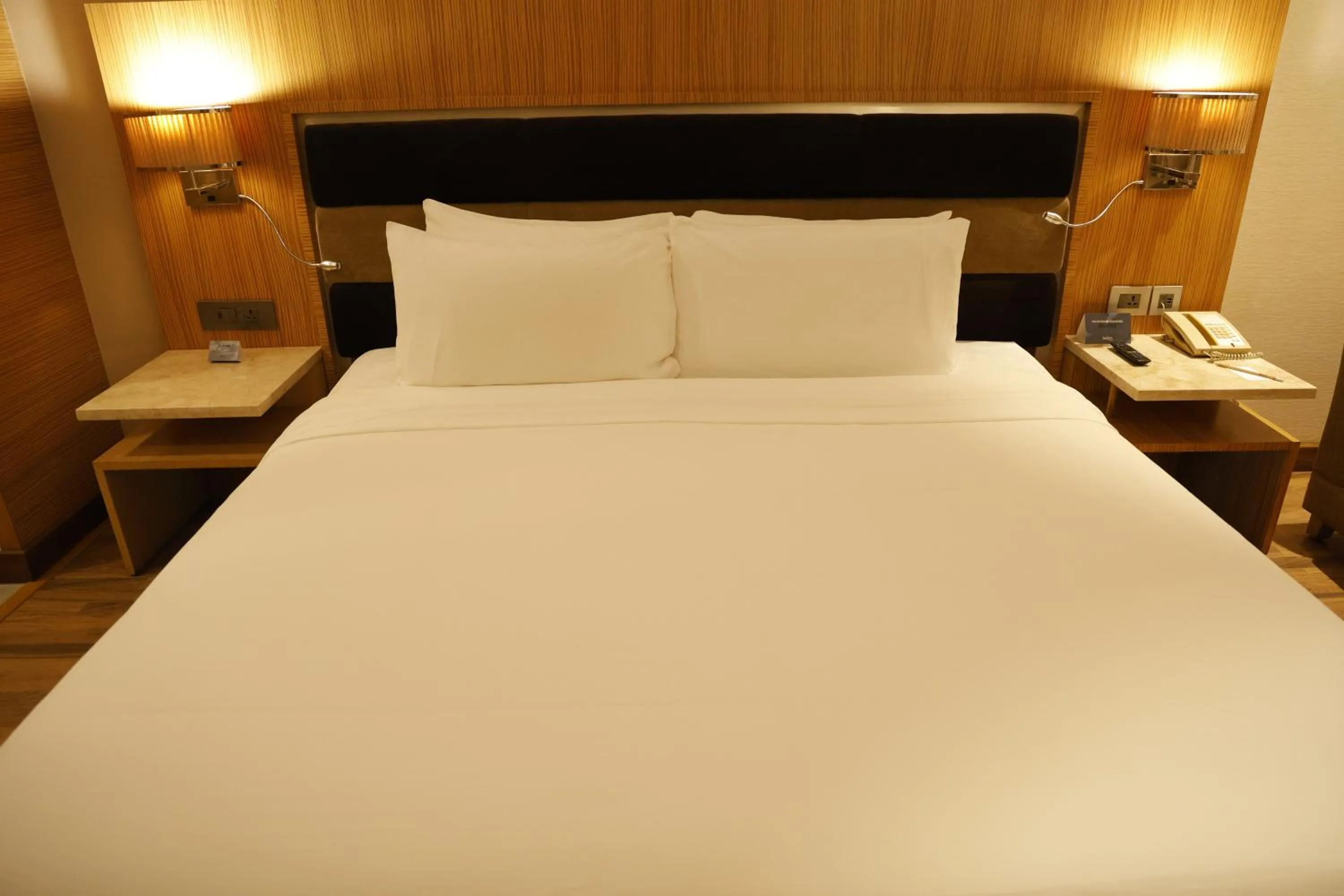 Bed in Radisson Resort & Spa Kandla